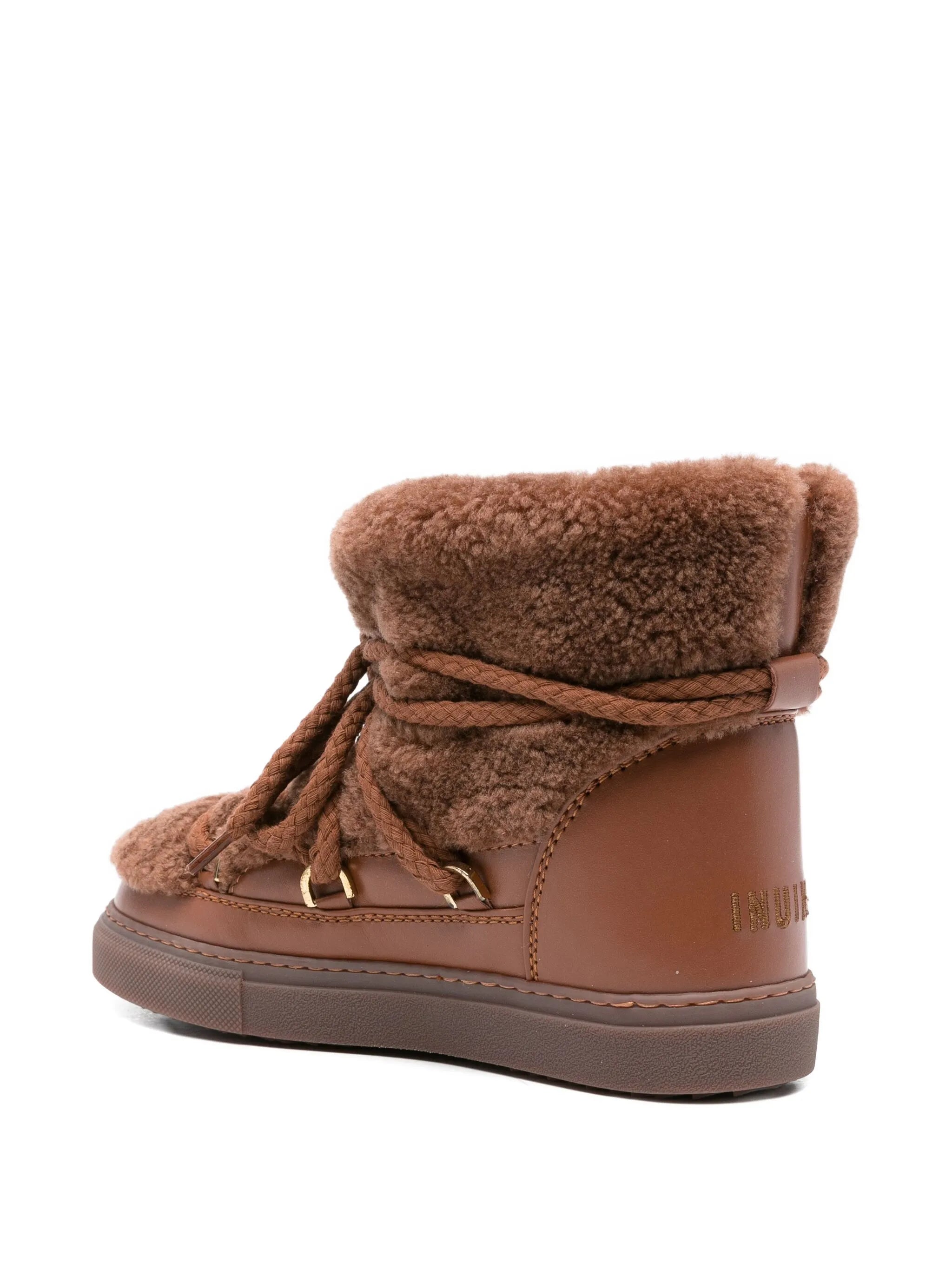 Curly leather ankle boots