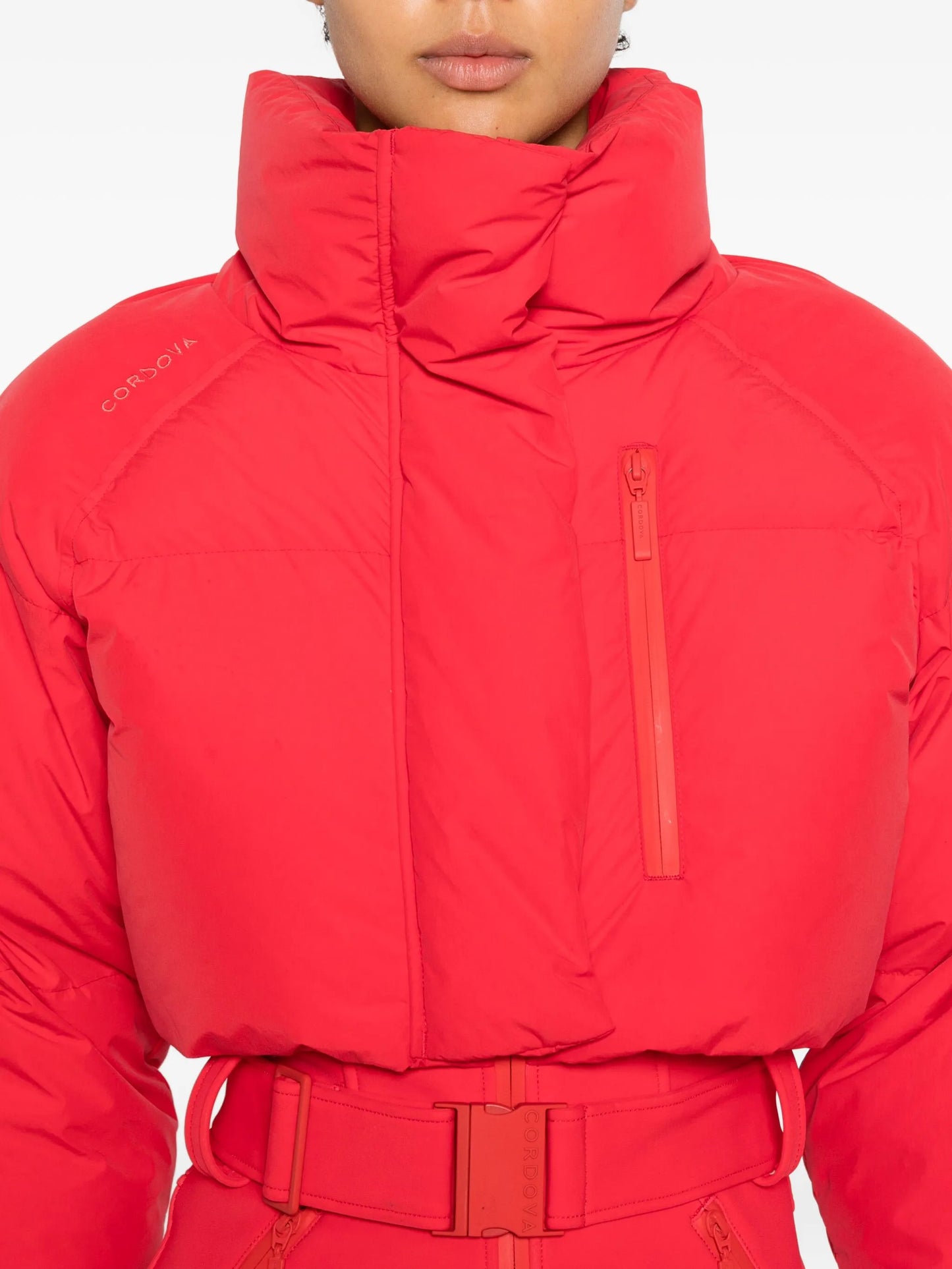 belted ski suit
