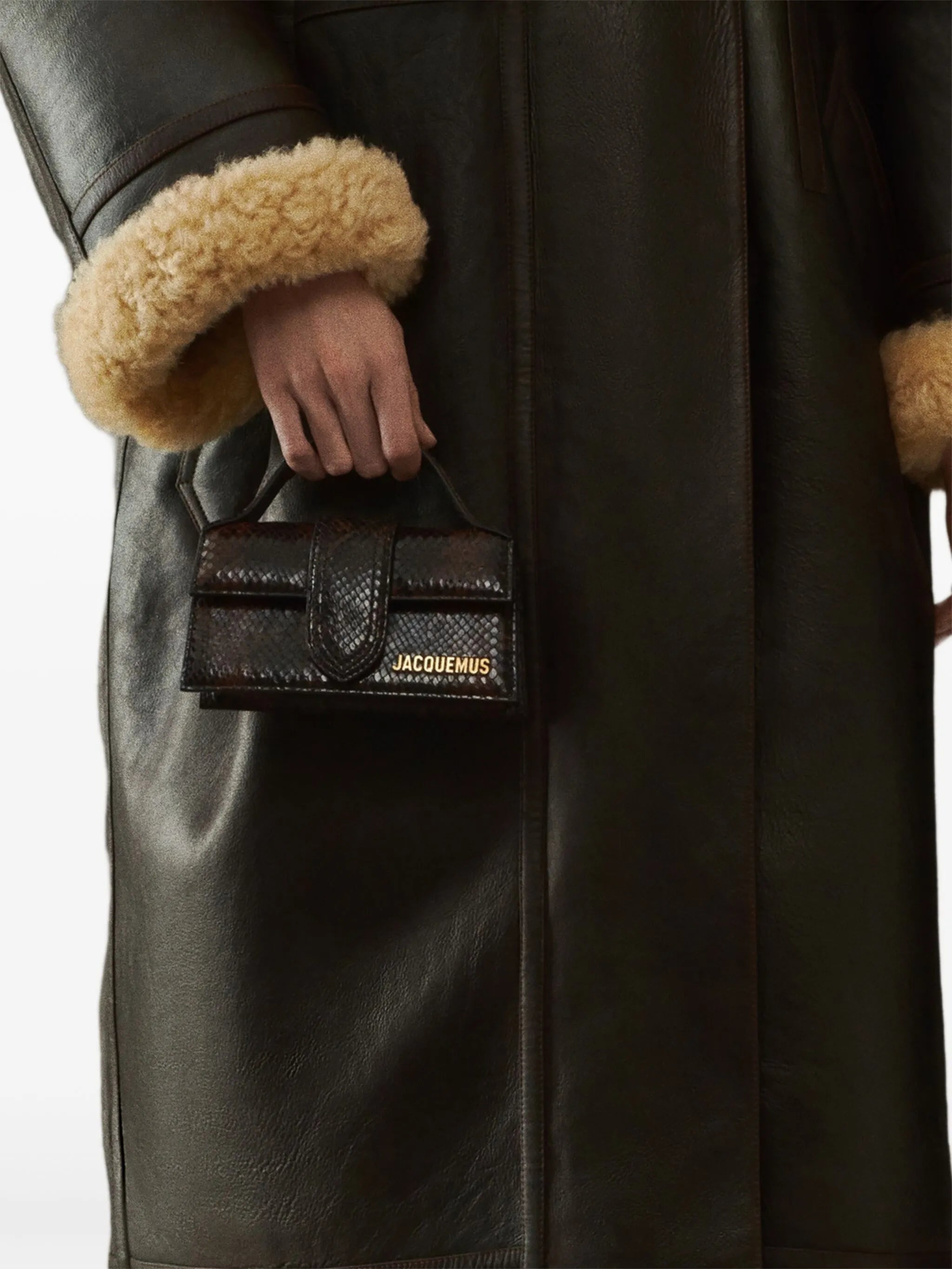 The Bambino top-handle leather clutch bag