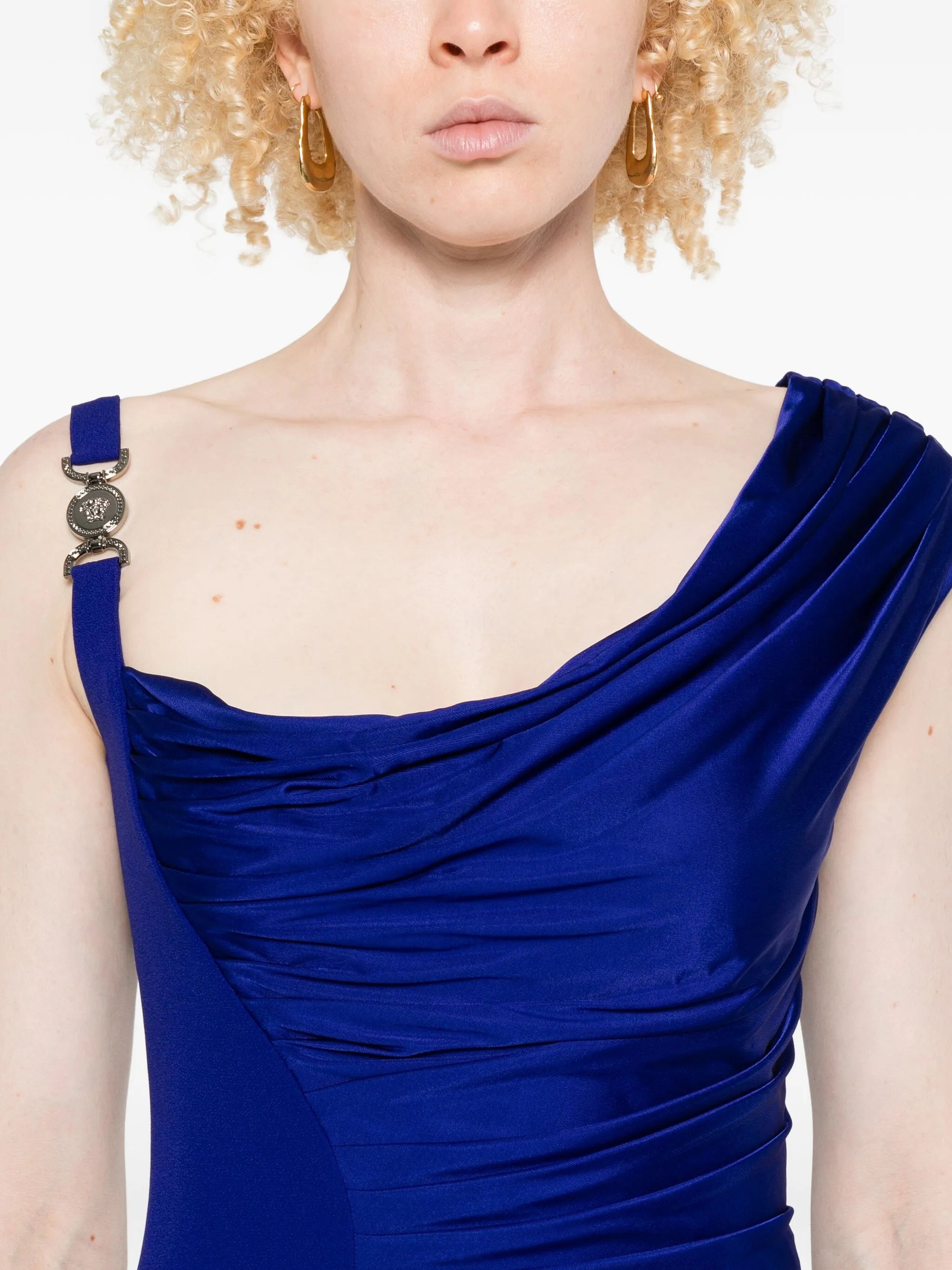 draped one-shoulder gown