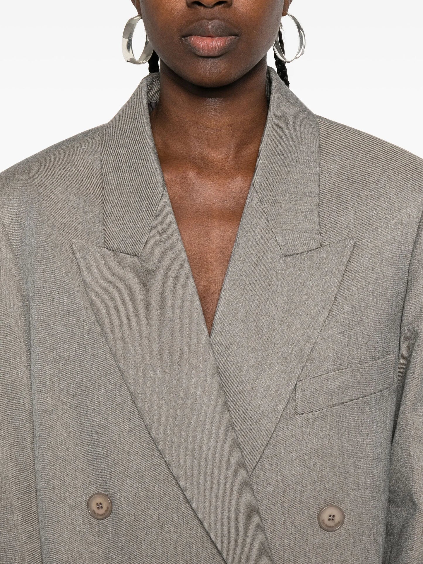 double-breasted peak-lapel coat