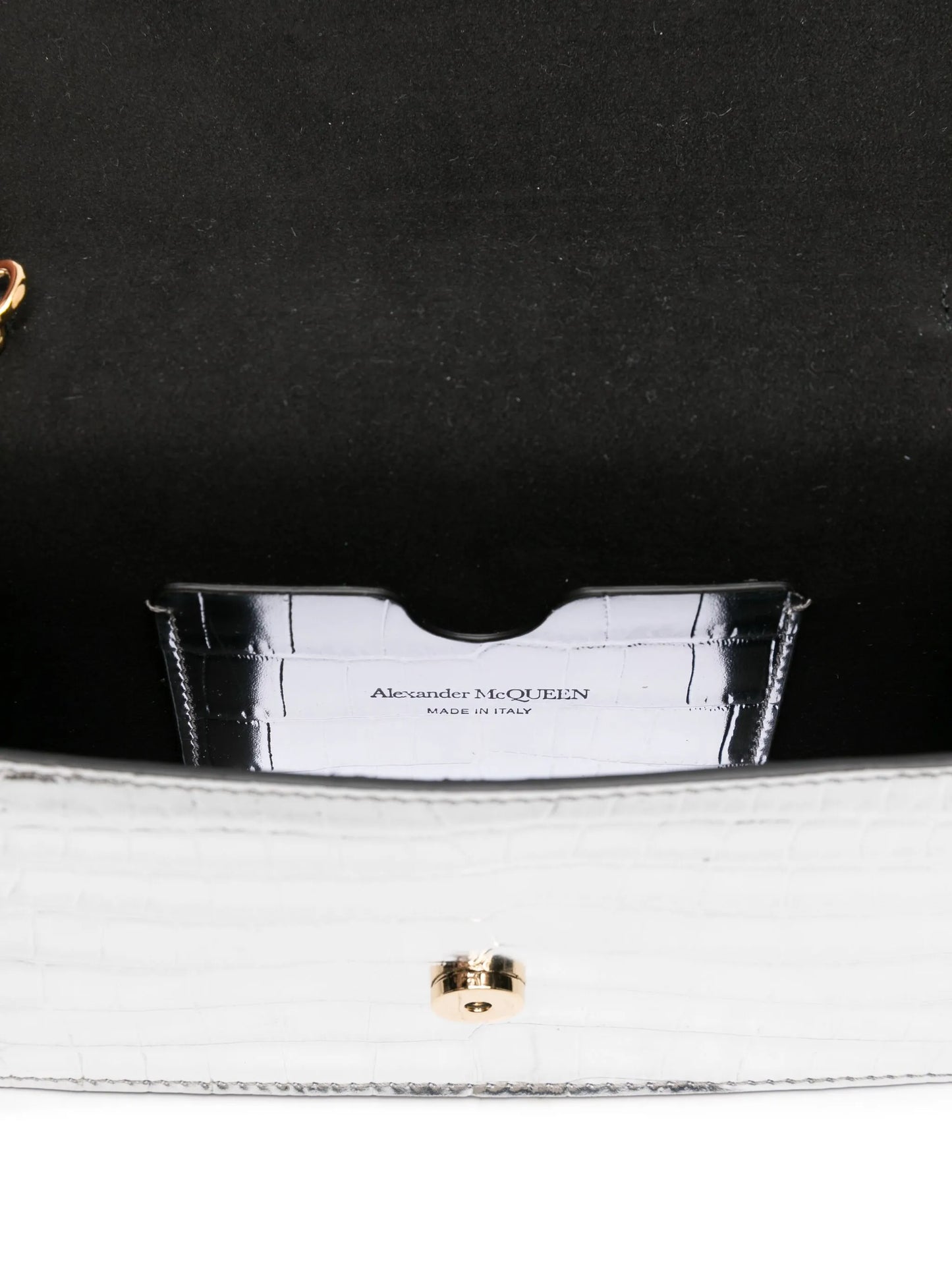 skull-embellished crocodile-effect bag