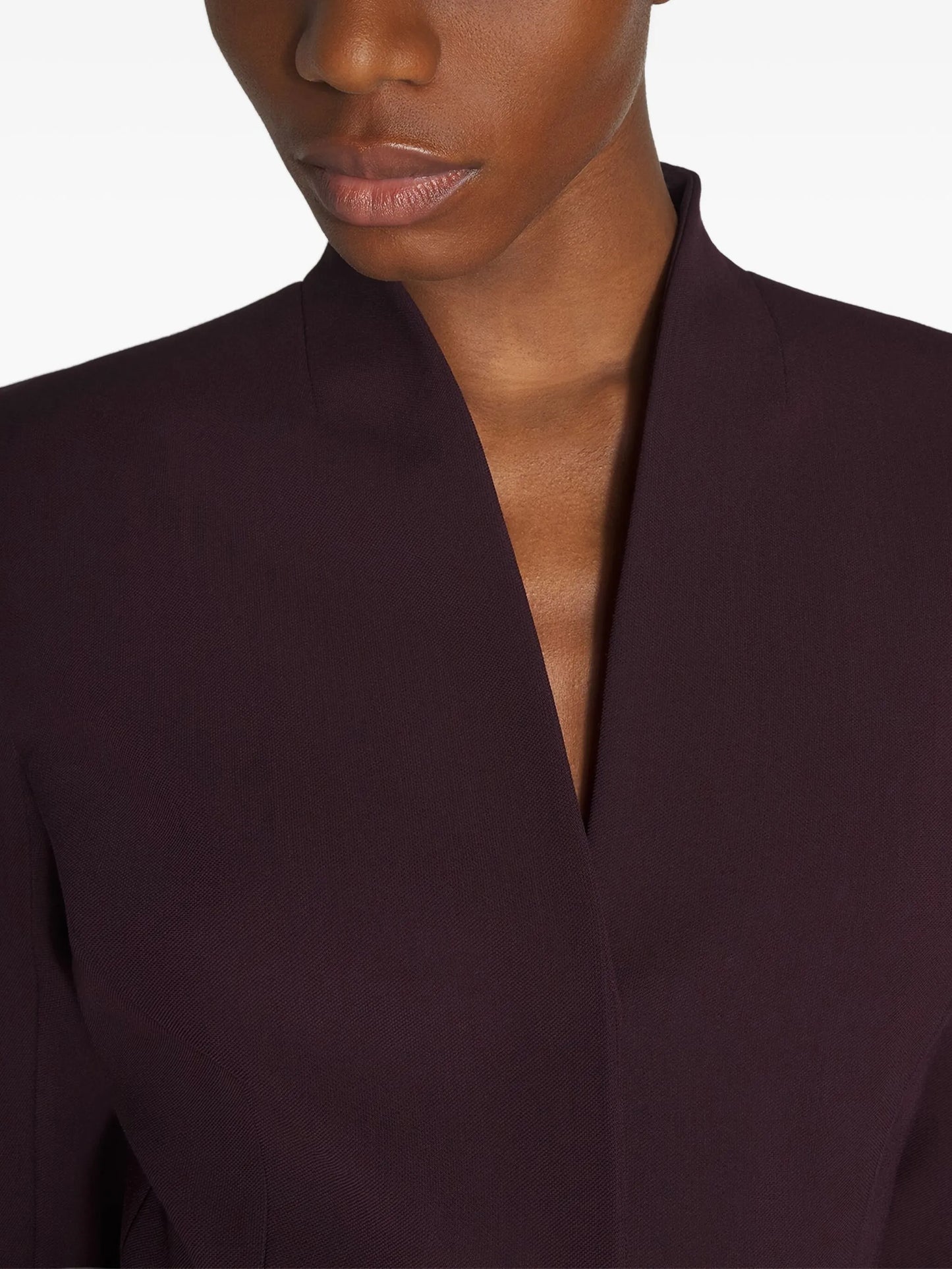 peplum-waist fitted jacket