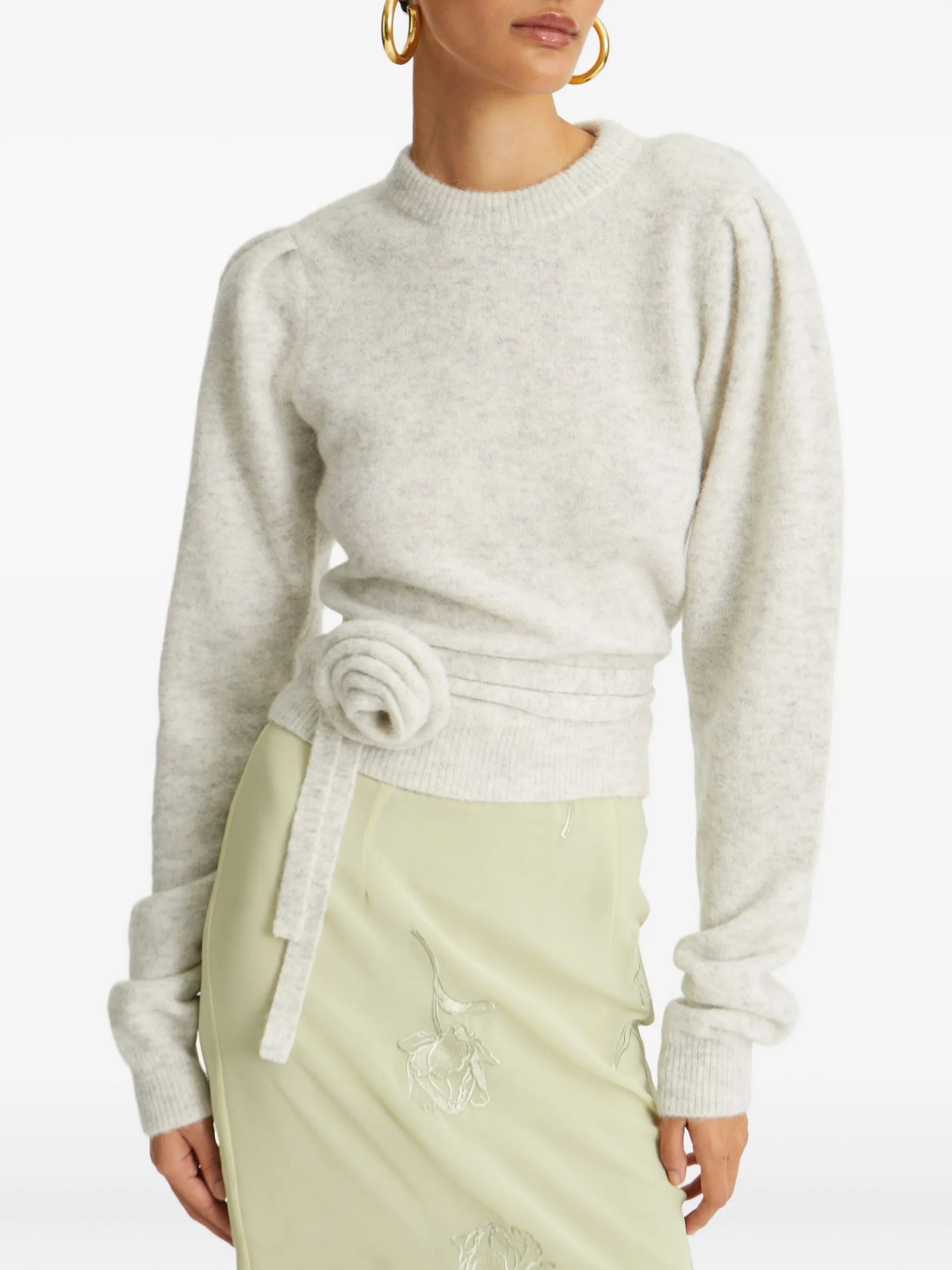 rose-embellished top