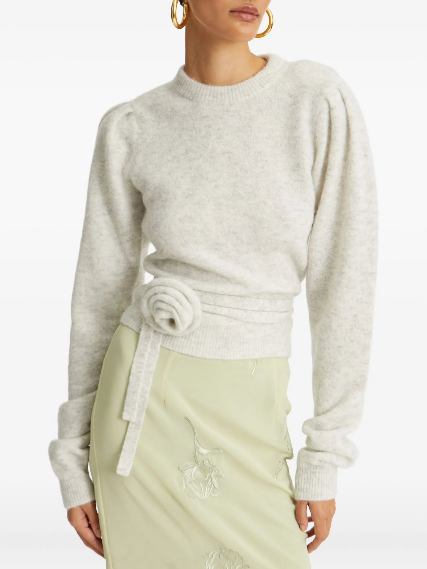 rose-embellished top