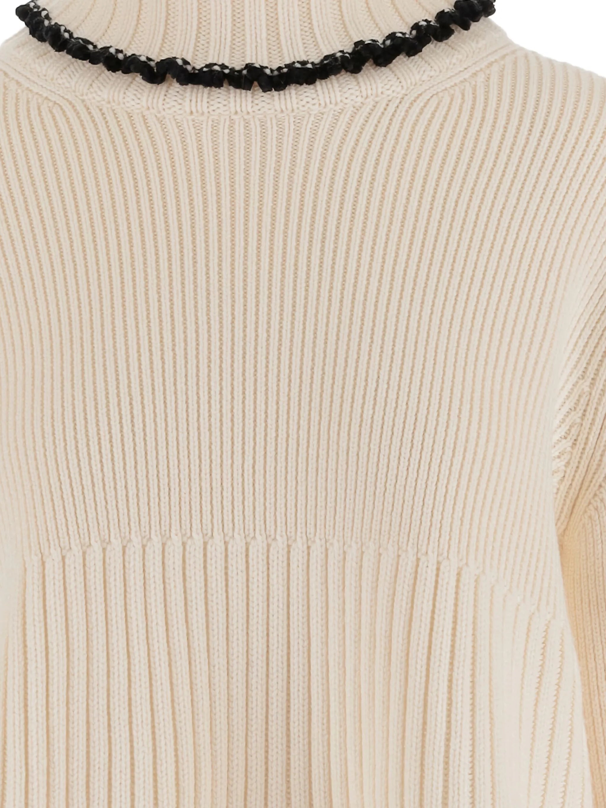 ribbed high-neck ruffled sweater