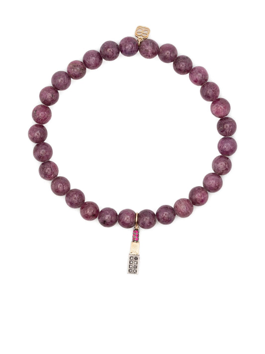 14K yellow gold diamond and ruby charm bracelet