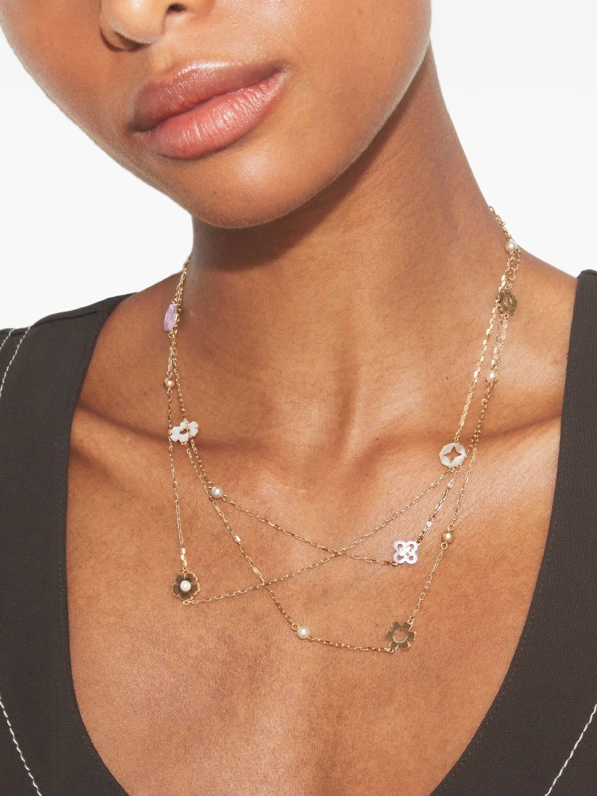 triple-strand flower-charm necklace