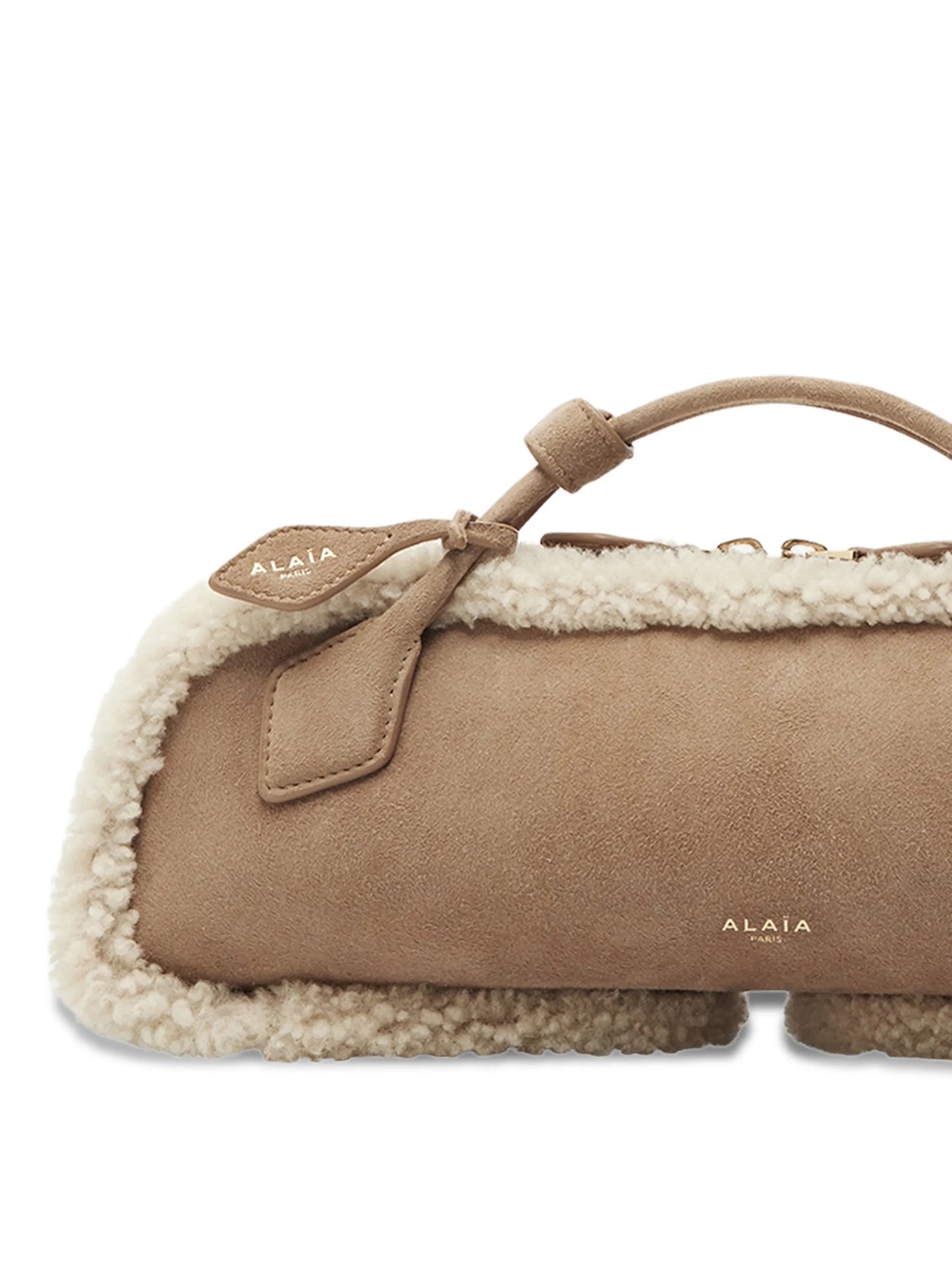 Le Teckel shearling clutch bag