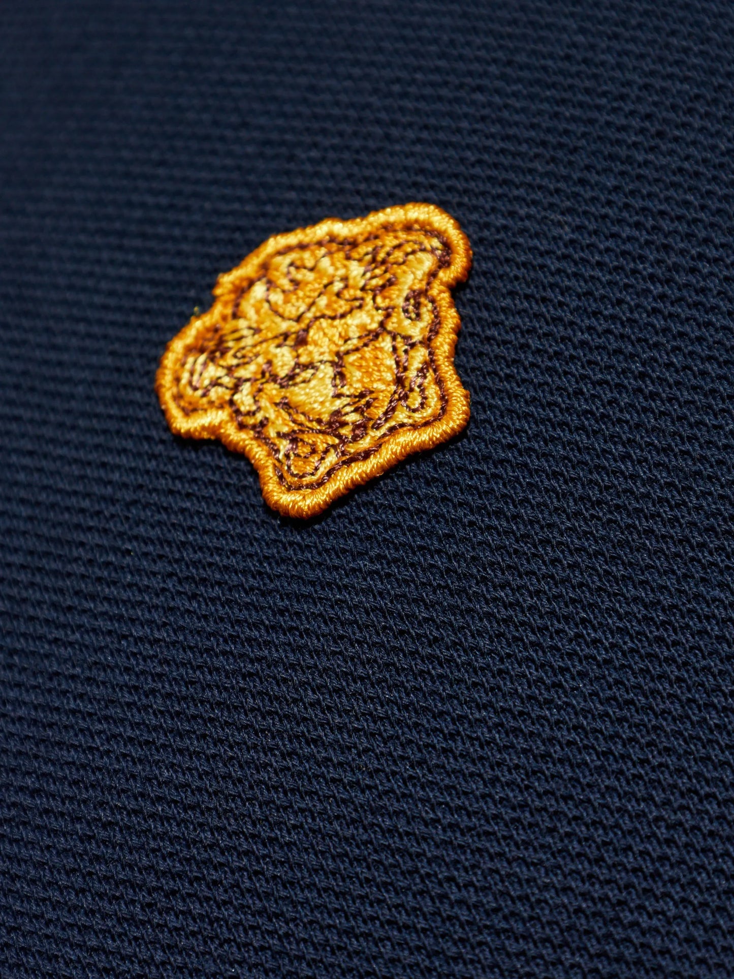Medusa Head-appliqué polo shirt