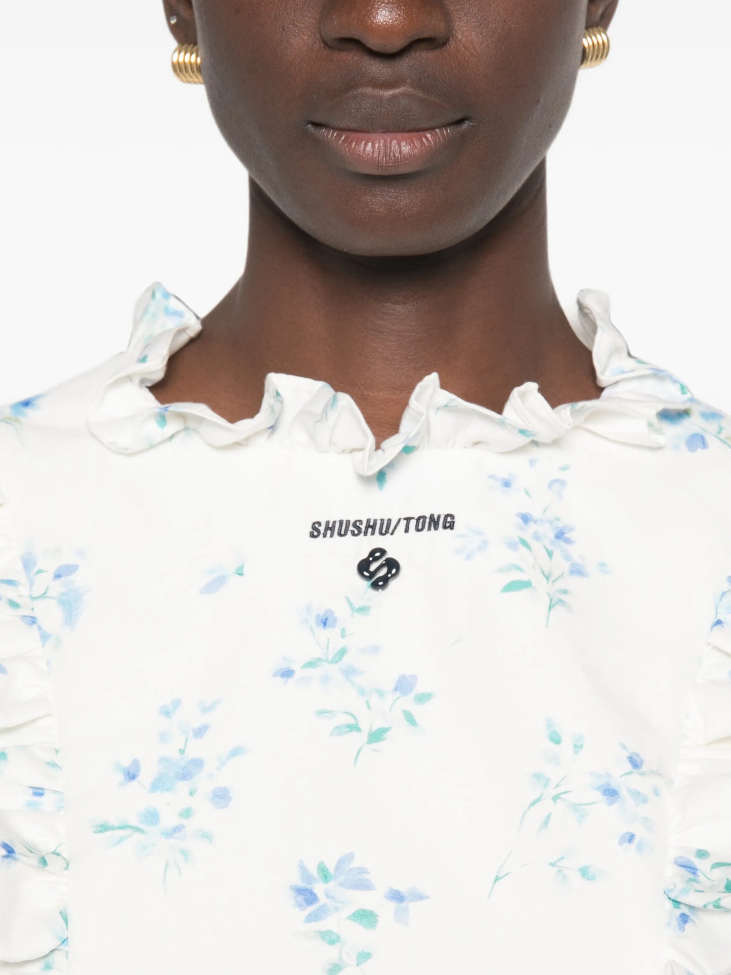 floral-print top