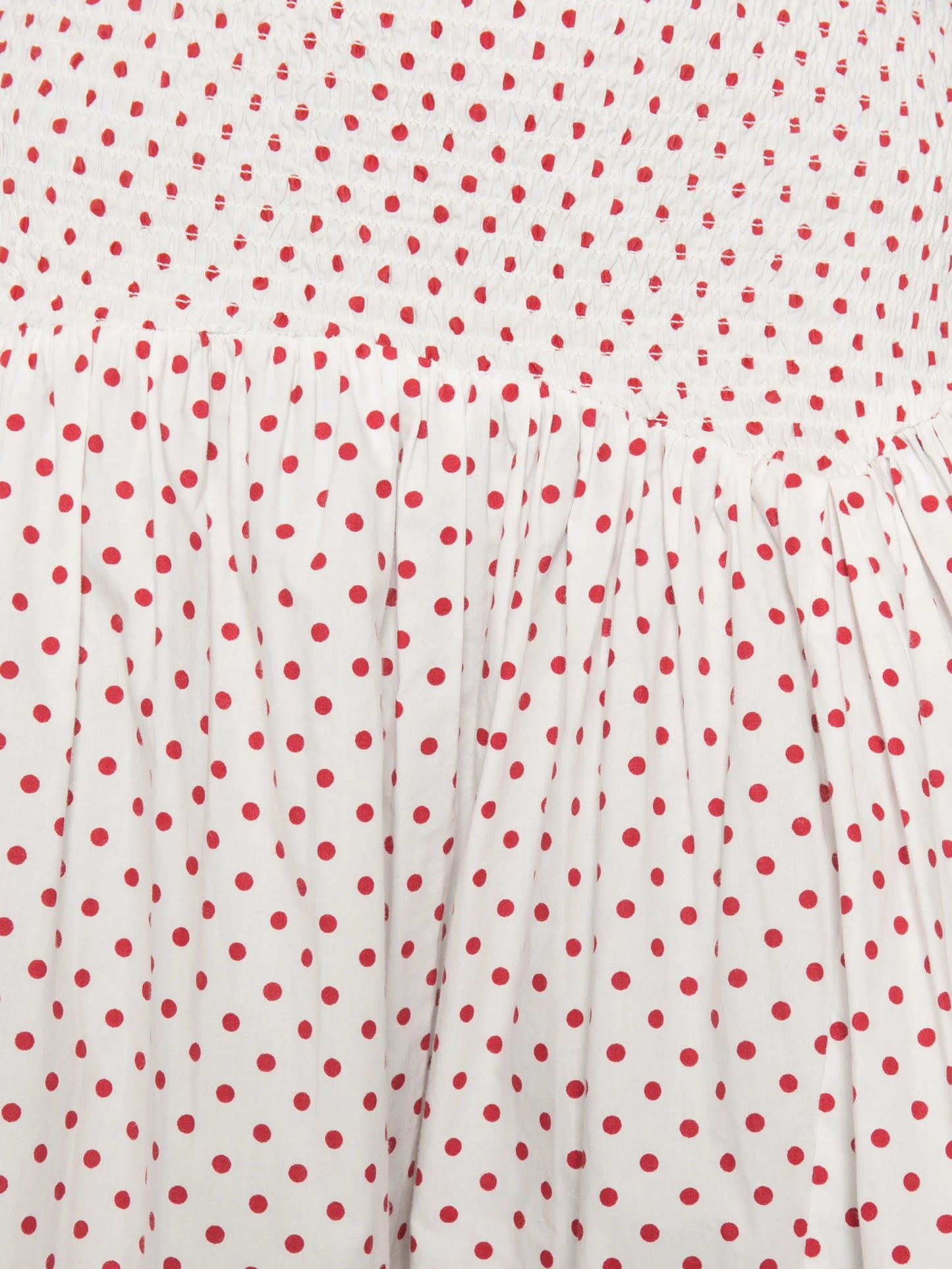 Layla polka-dot smocked midi skirt