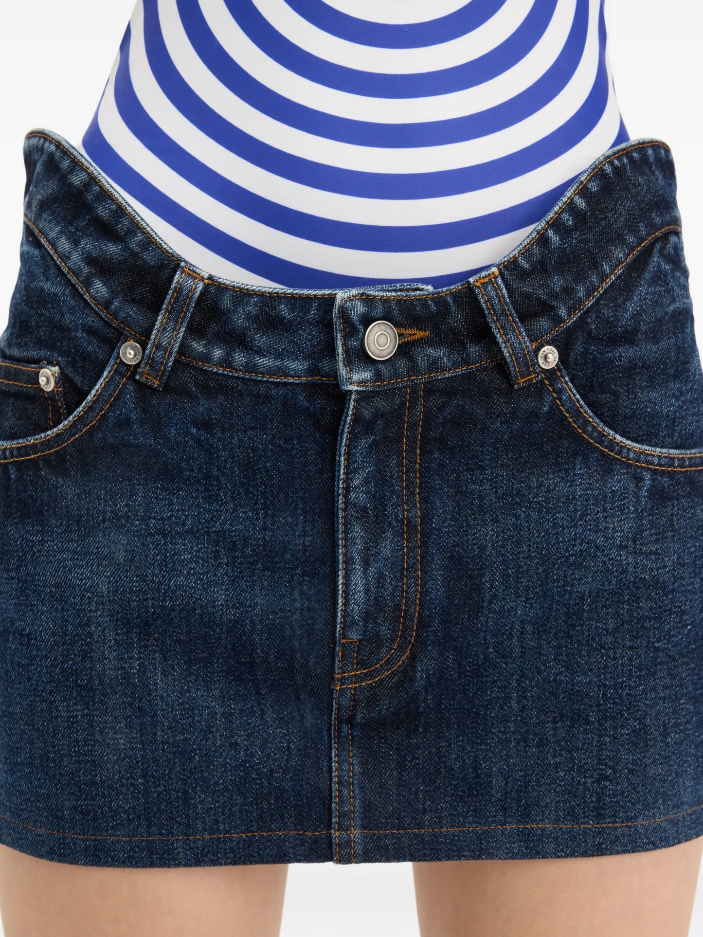 The Curved denim mini skirt