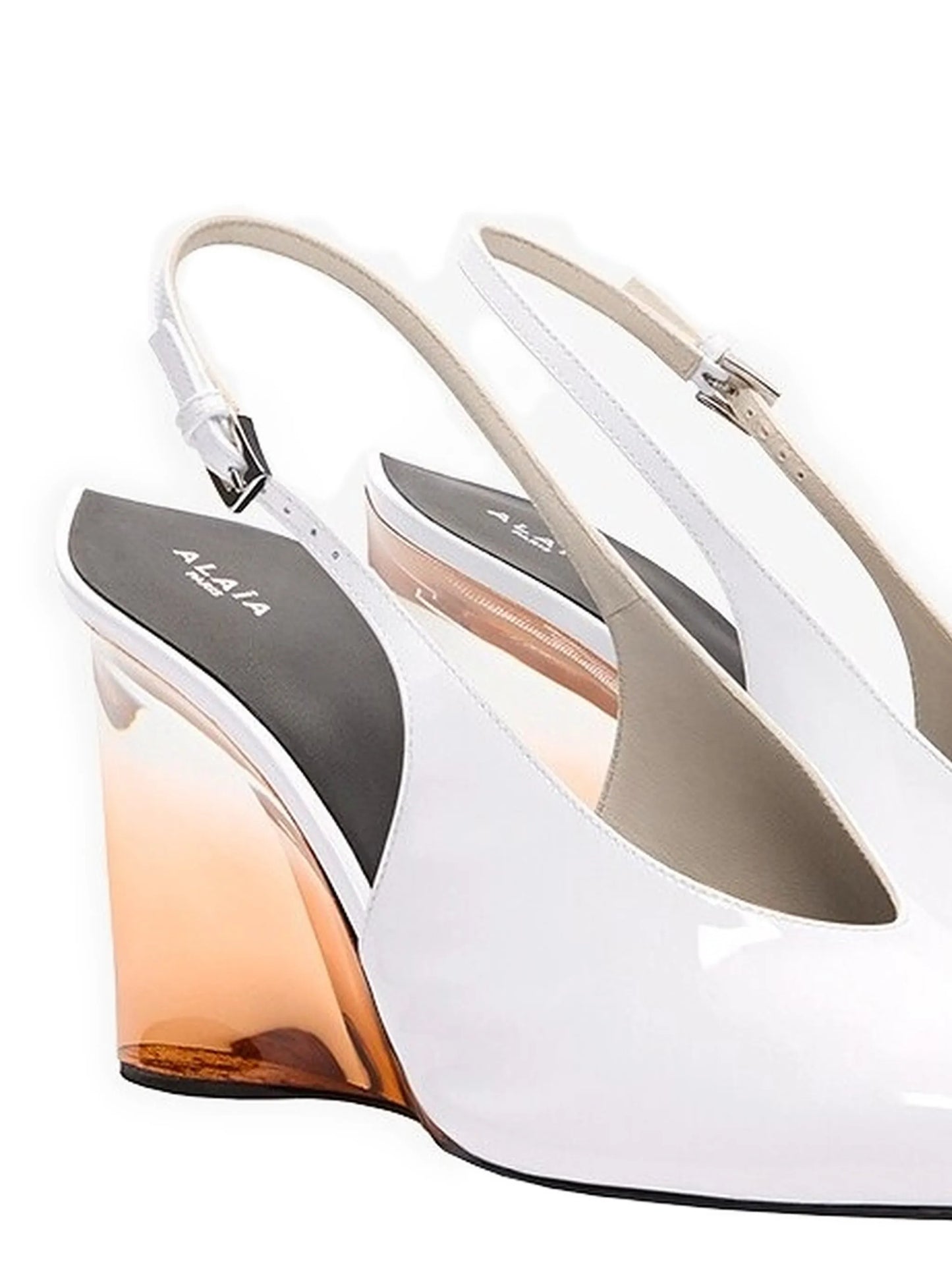 invisible wedge slingback in patent calfskin pumps