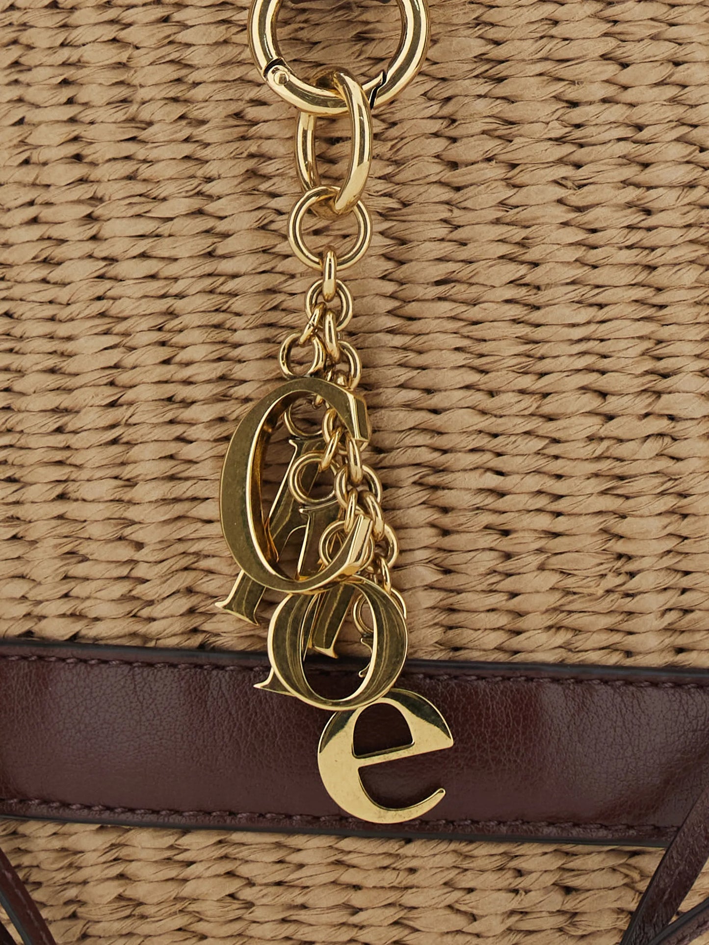 charm-embellished bucket bag