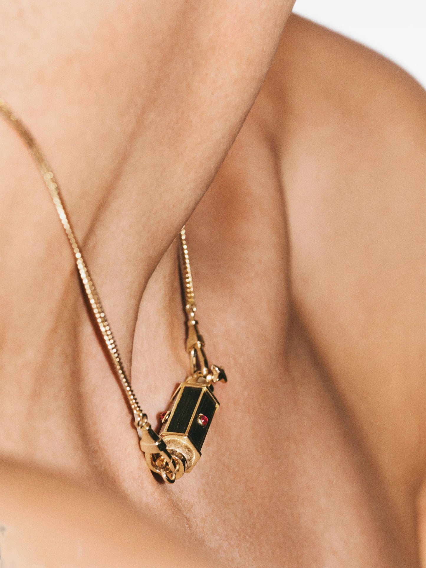 Ebony Baby ruby-embellishment necklace