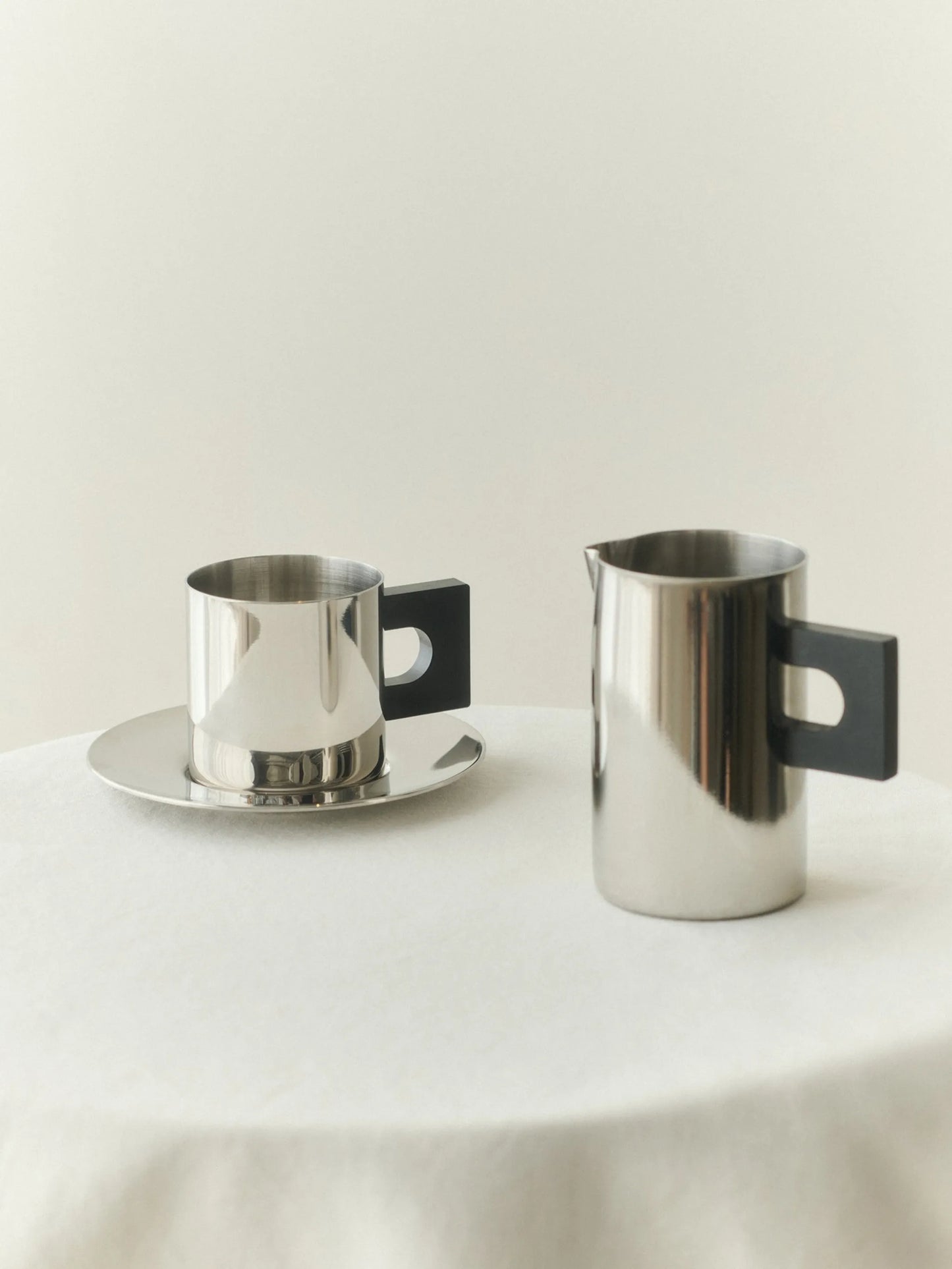S.R polished-finish geometric-handle pitcher