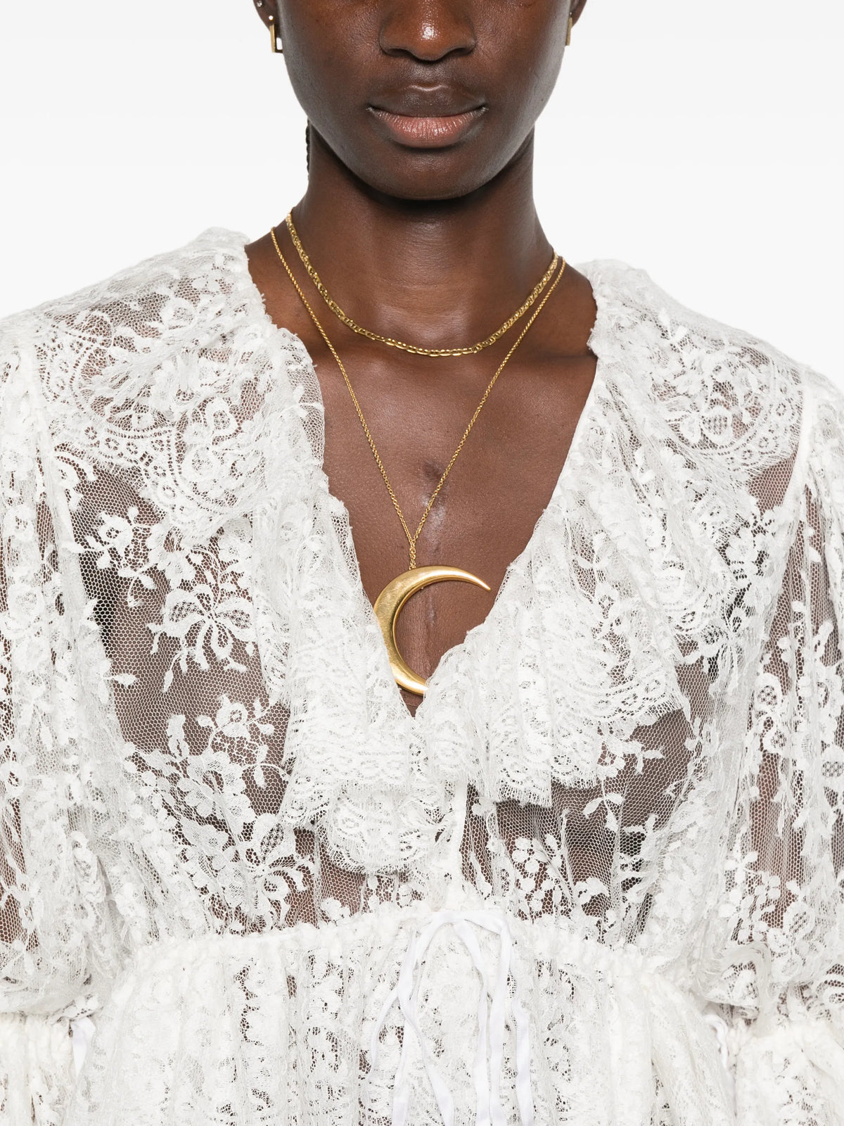 cropped lace top with ruffles and v-neckline