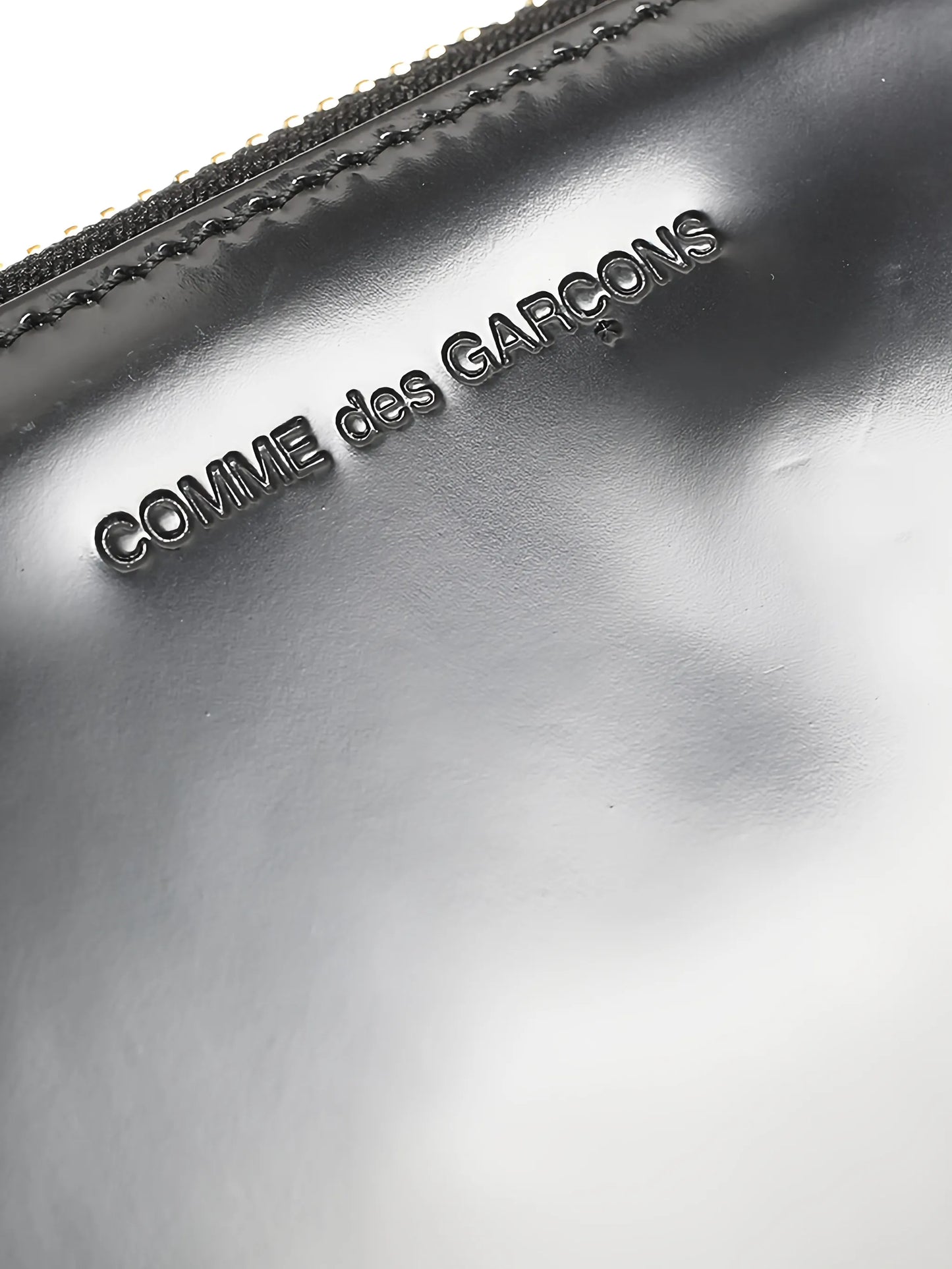 logo-debossed leather clutch