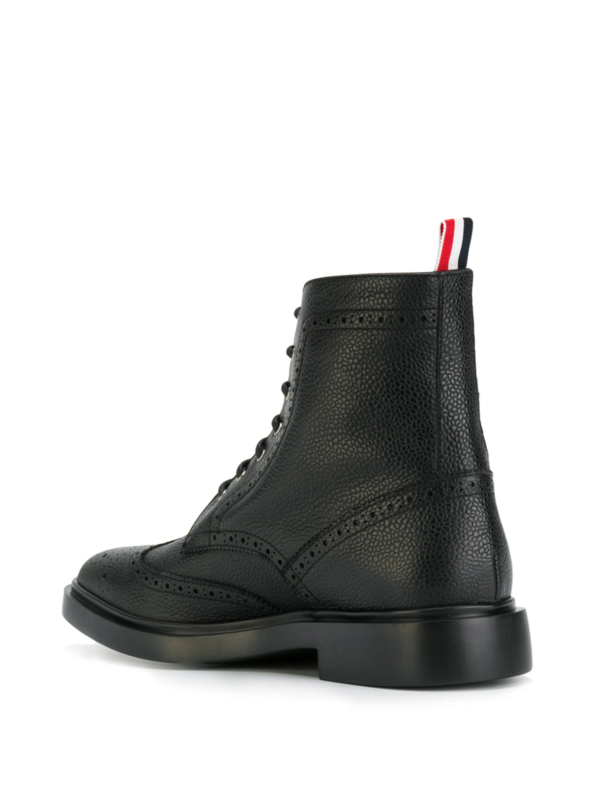 pebble grain leather Wingtip boots with rubber soles