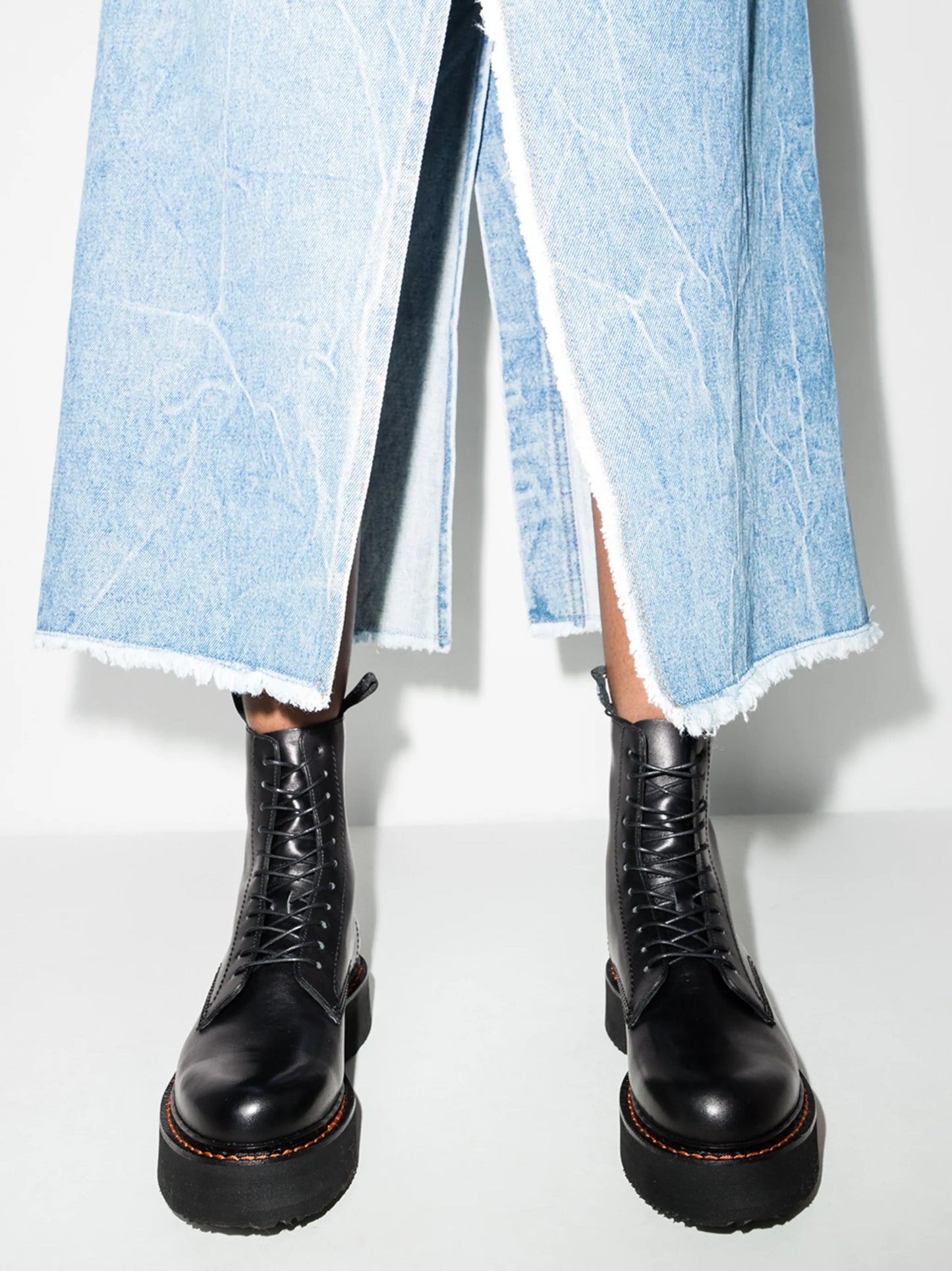 Stack 40 military boots