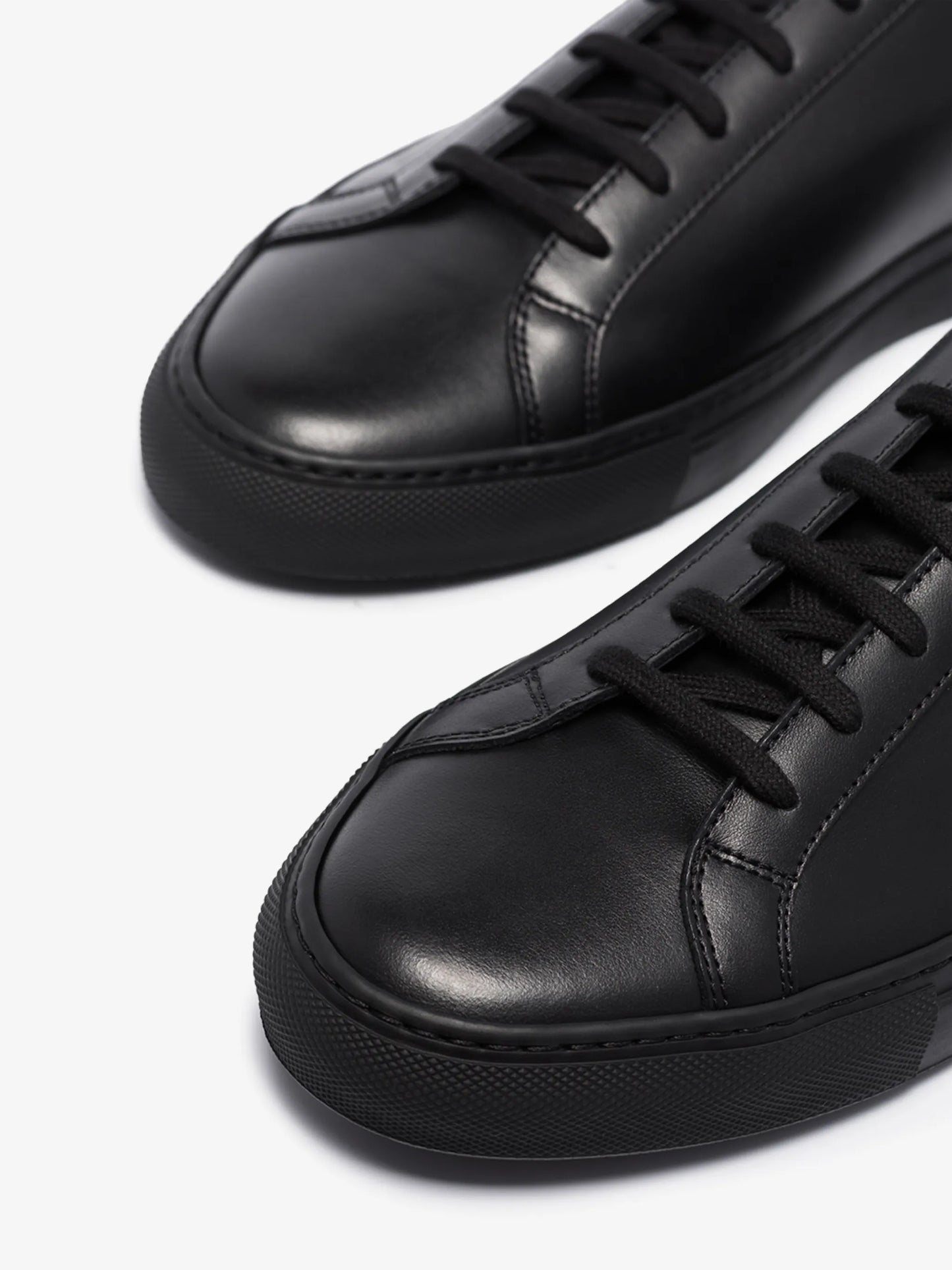 black Achilles leather low-top sneakers