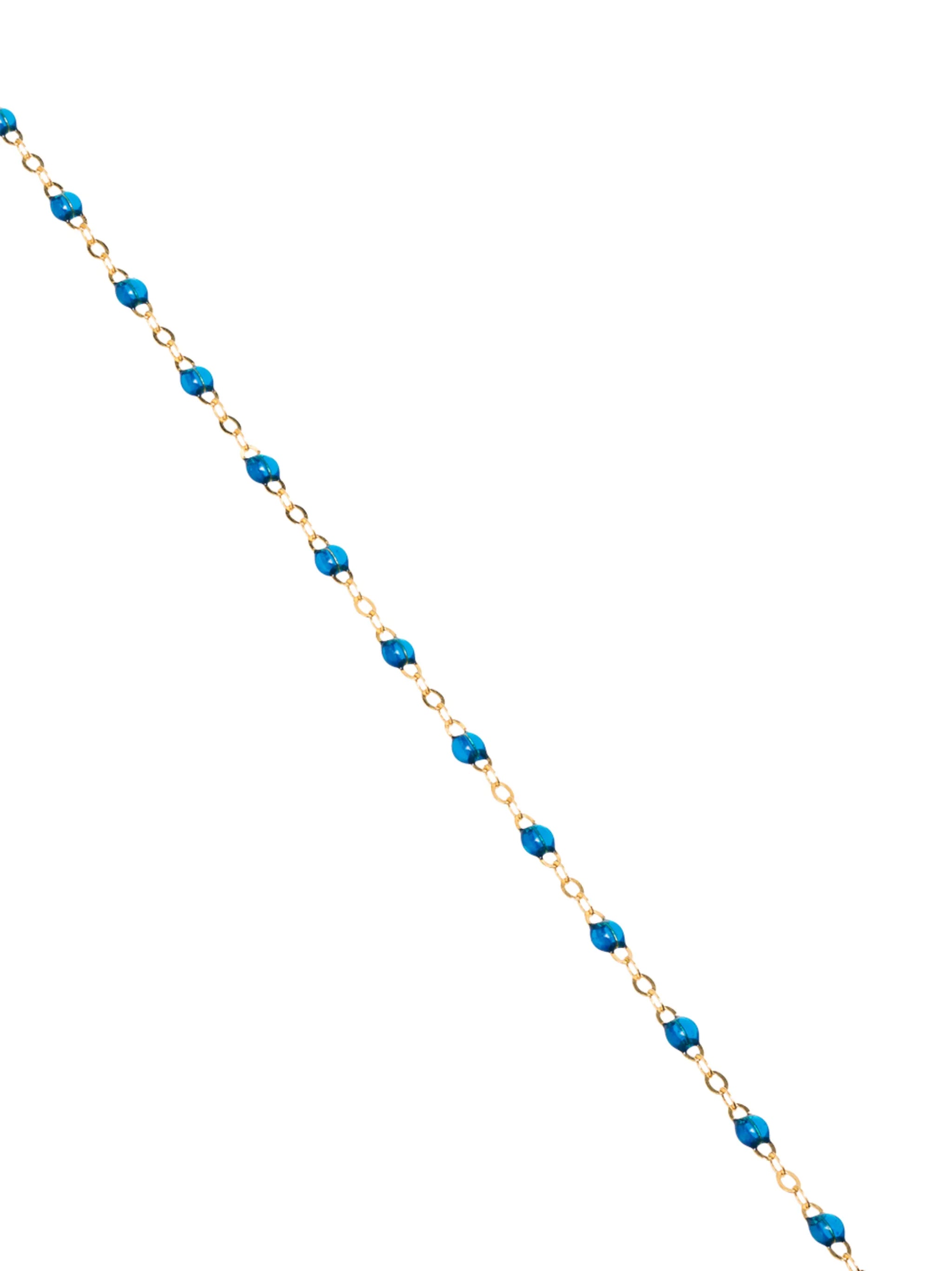 18kt yellow gold blue diamond necklace