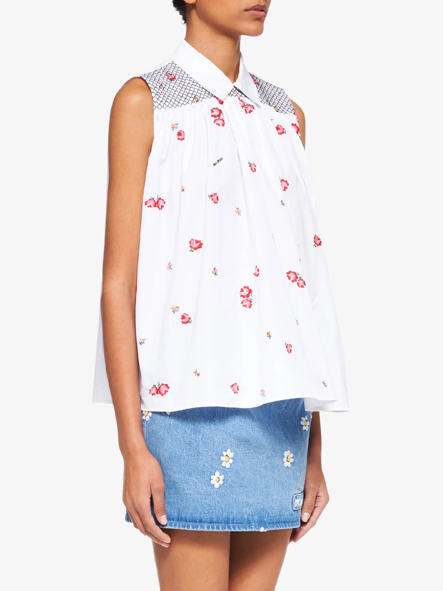 floral-embroidered sleeveless blouse
