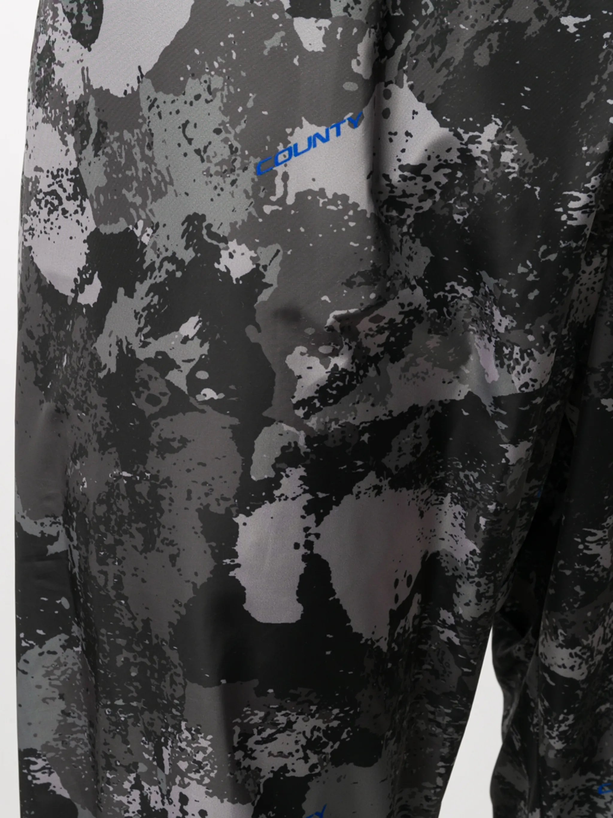 high-rise camouflage-print track pants