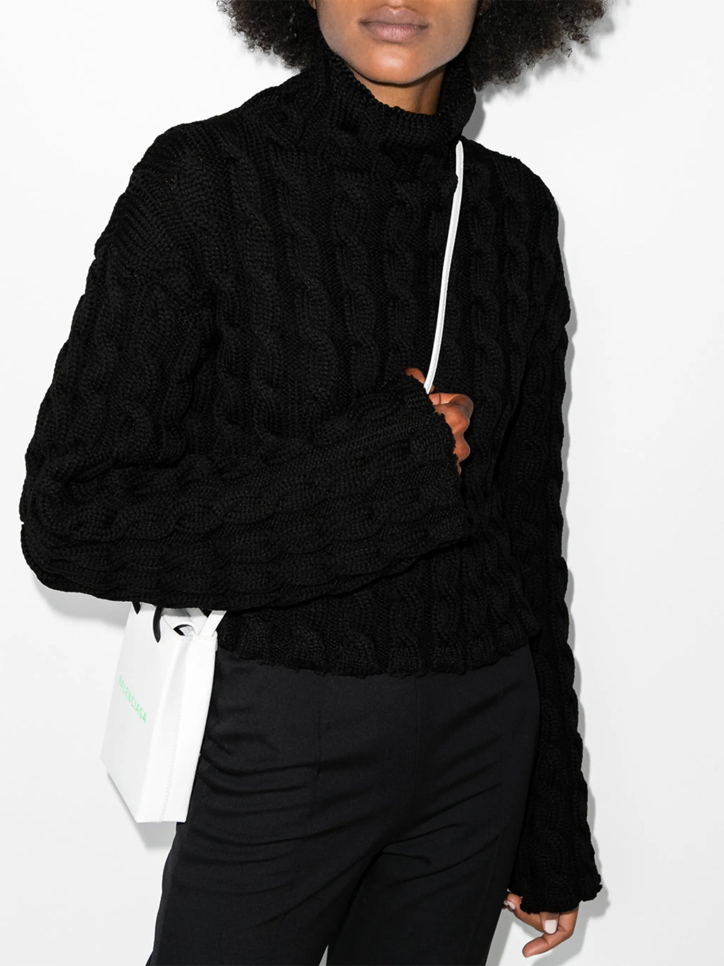 high-neck cable-knit jumper
