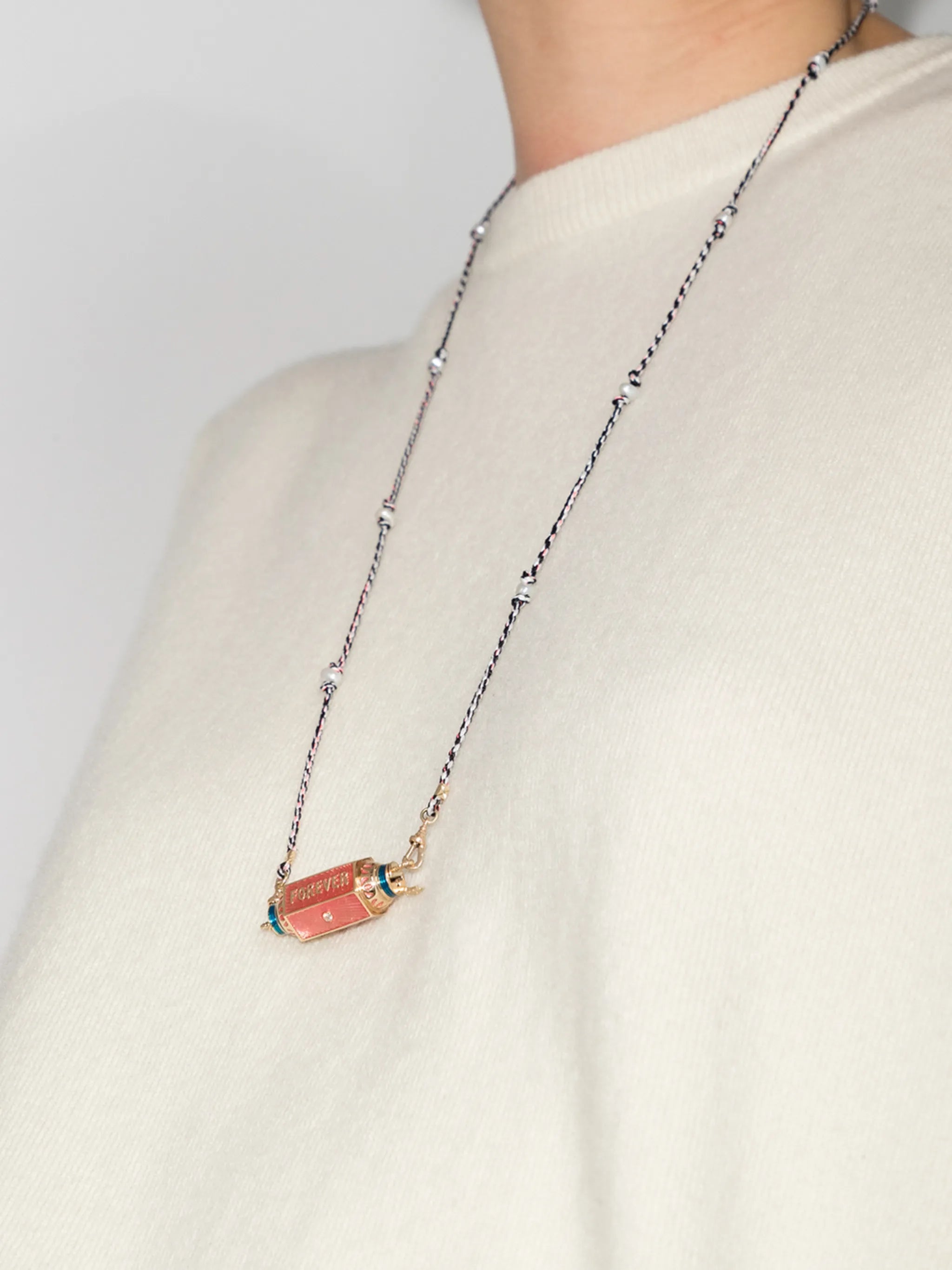 14kt yellow gold Eye Will locket necklace
