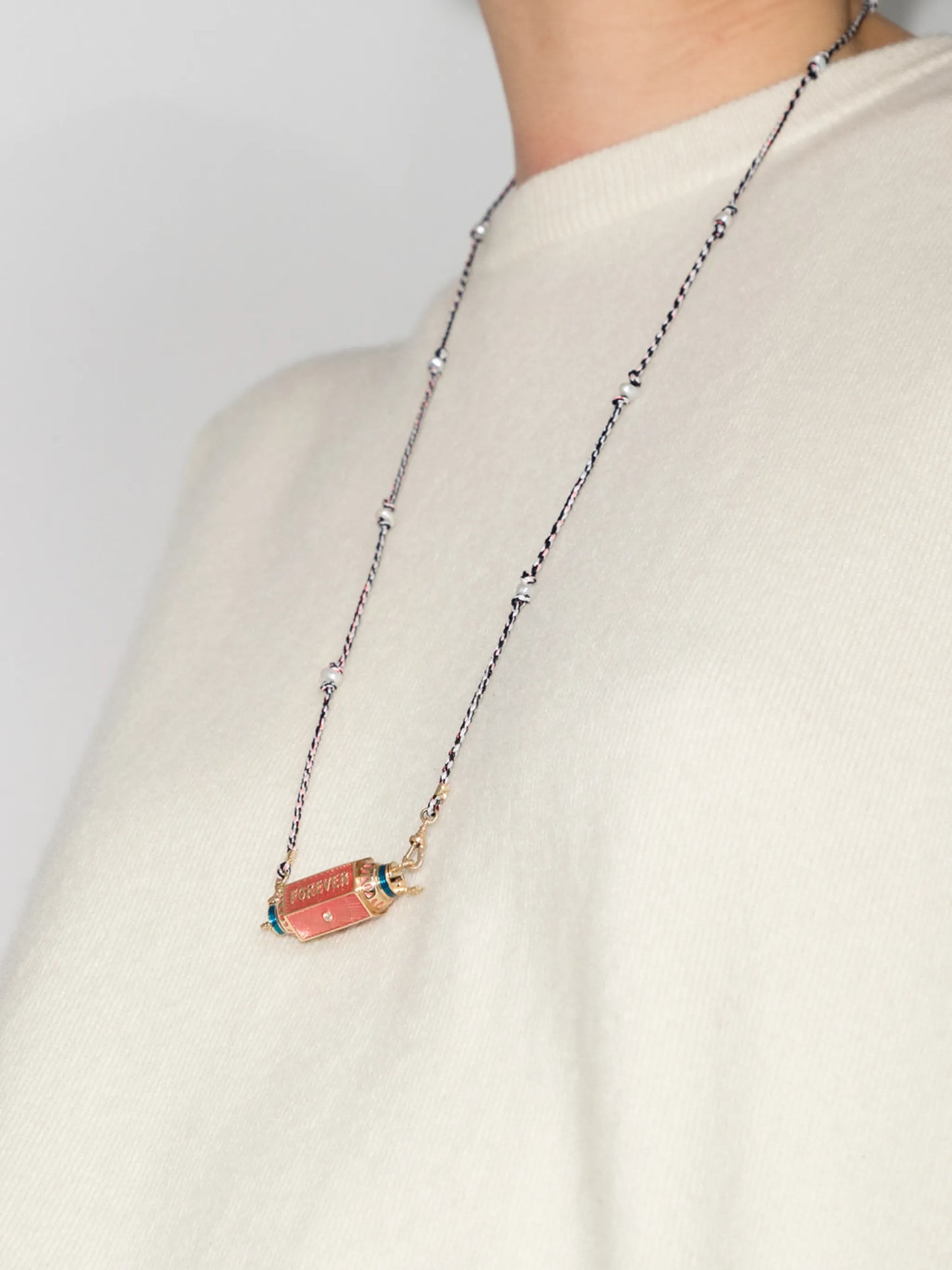 14kt yellow gold Eye Will locket necklace