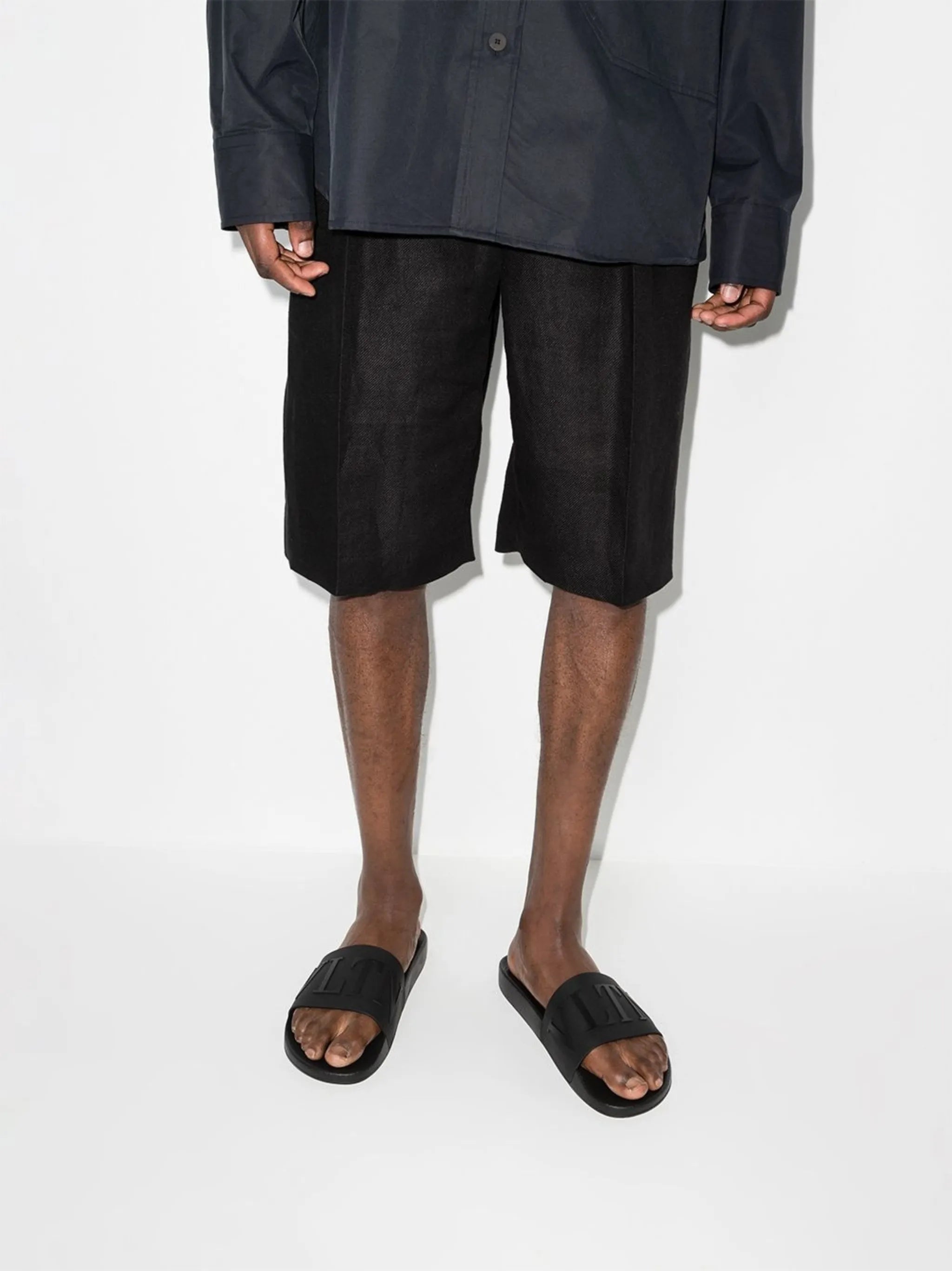 embossed-logo flip-flops
