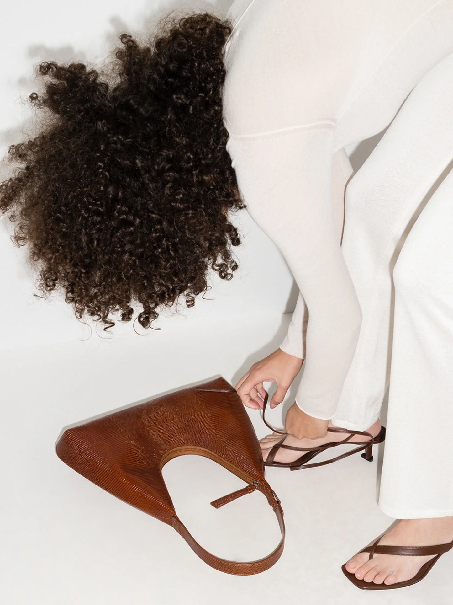 Amber lizard-skin effect shoulder bag