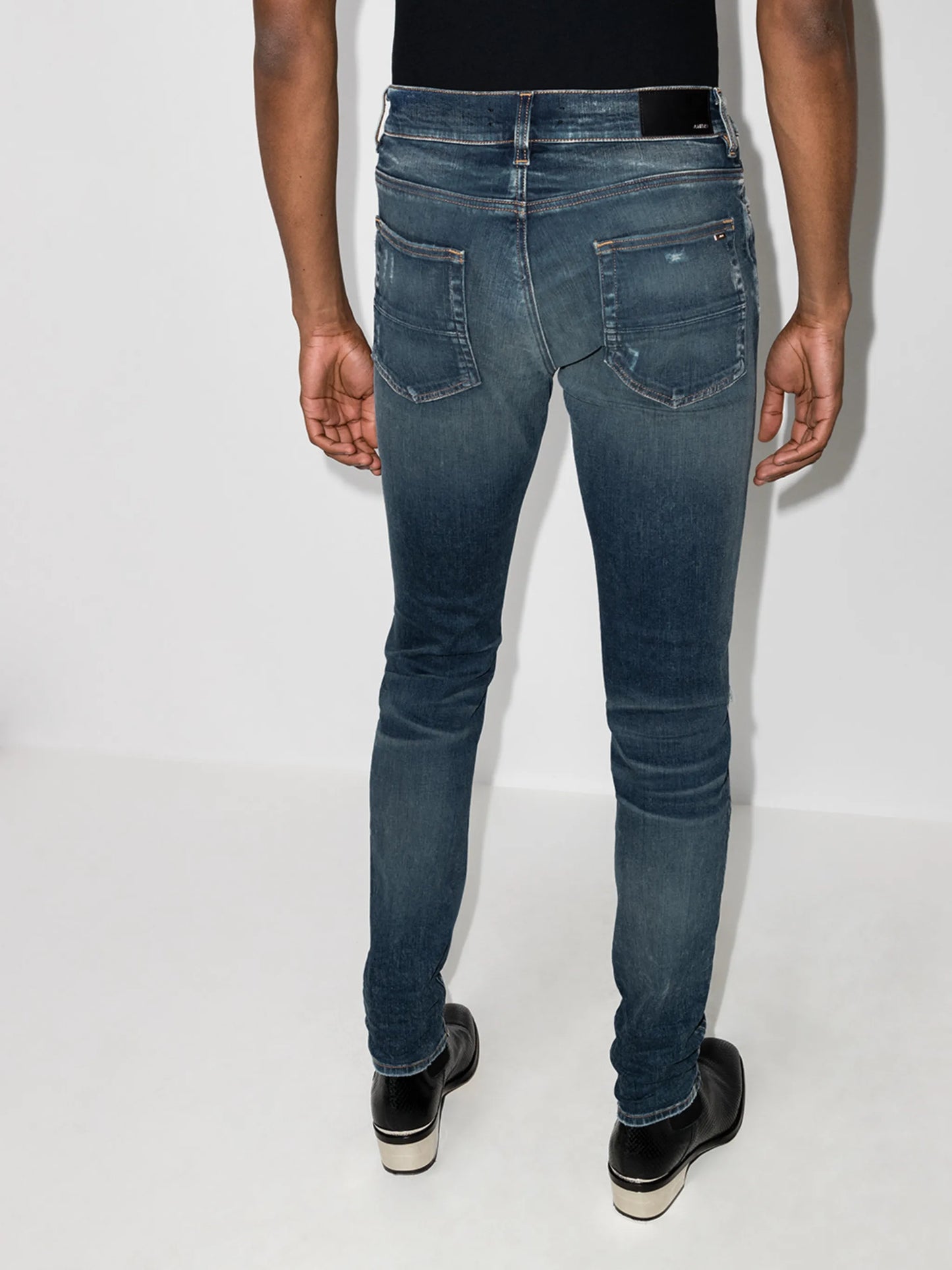 distressed-finish skinny jeans