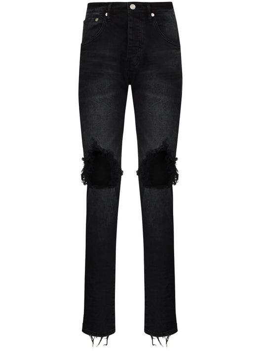 low-rise "Black Wash Blowout" slim jeans