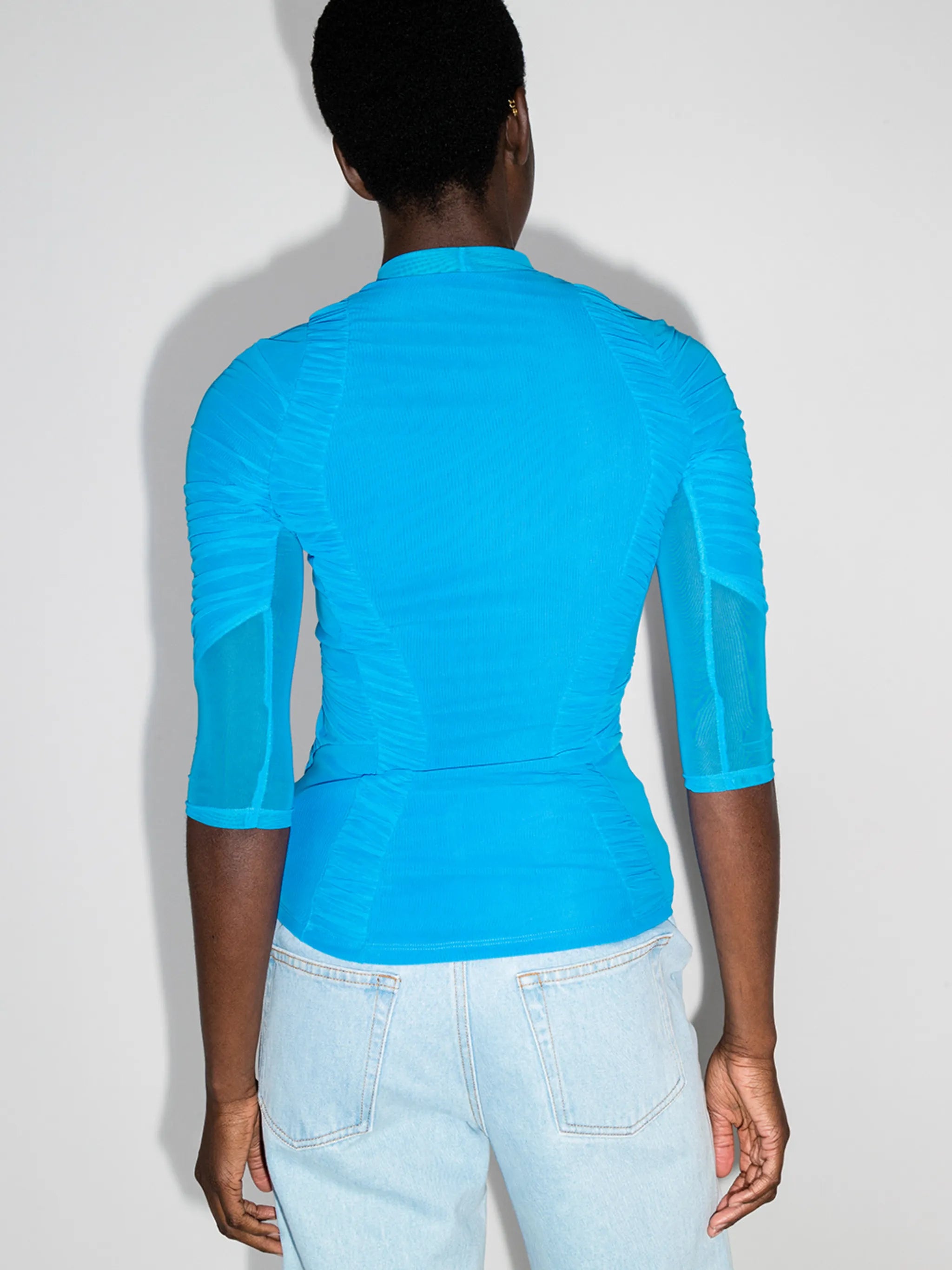 Hydrodynamic ruched crew neck top