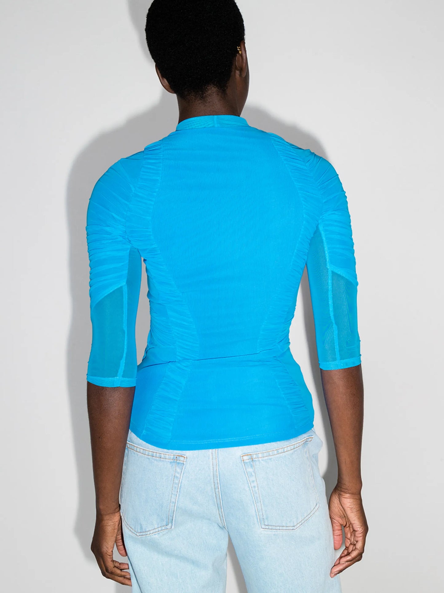 Hydrodynamic ruched crew neck top