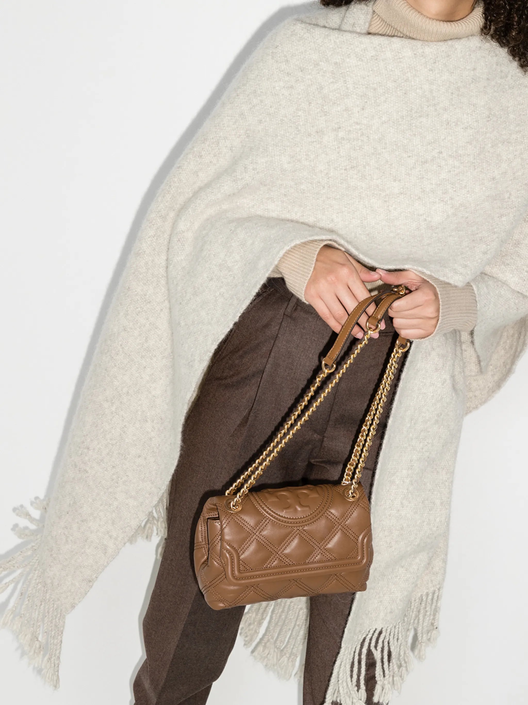 quilted raised logo crossbody bag