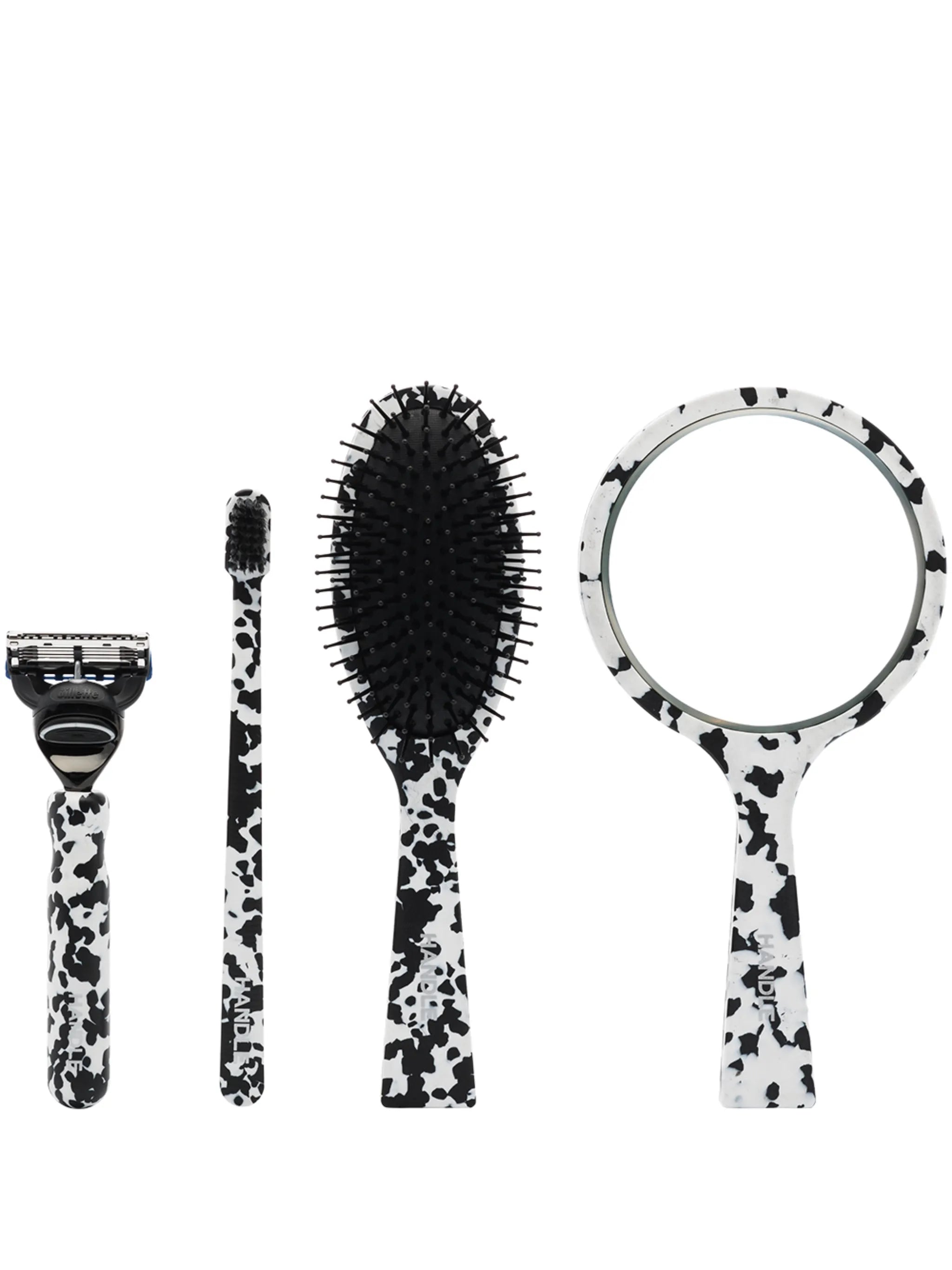marble-pattern four-piece grooming gift set