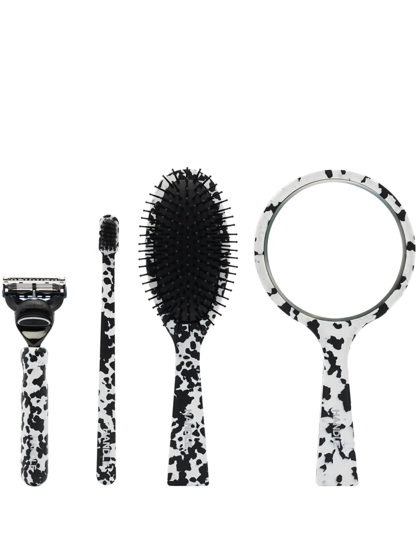 marble-pattern four-piece grooming gift set