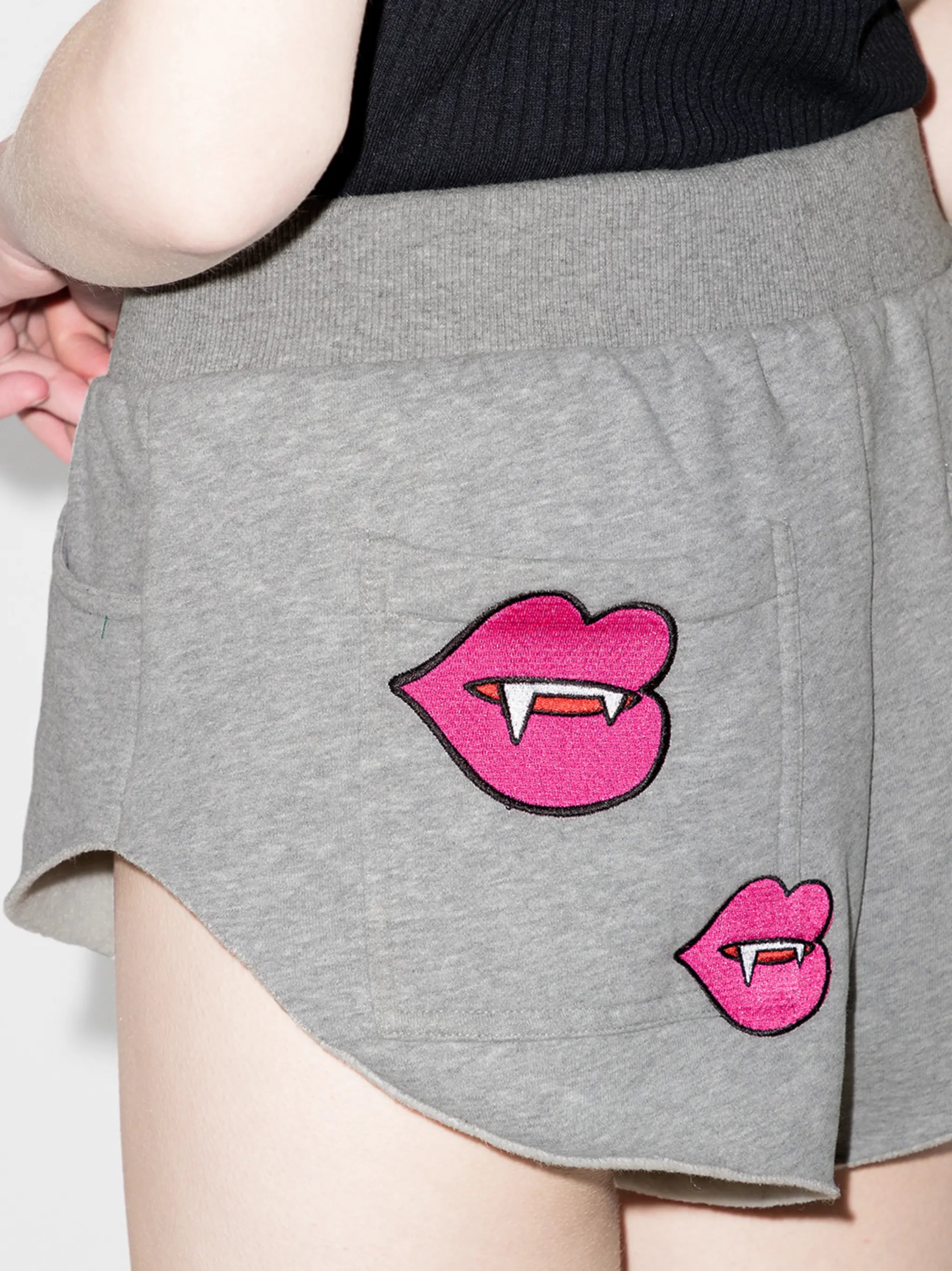 patch-detailing track shorts