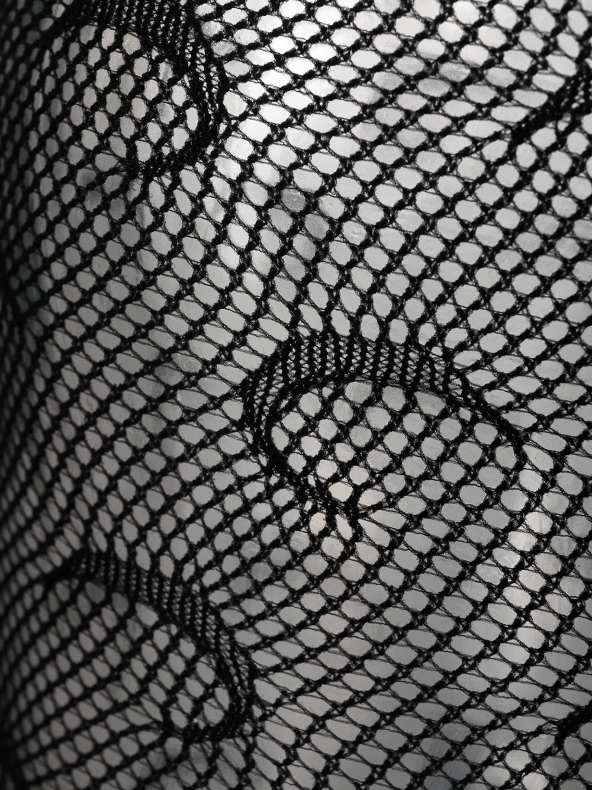 half-moon fishnet tights