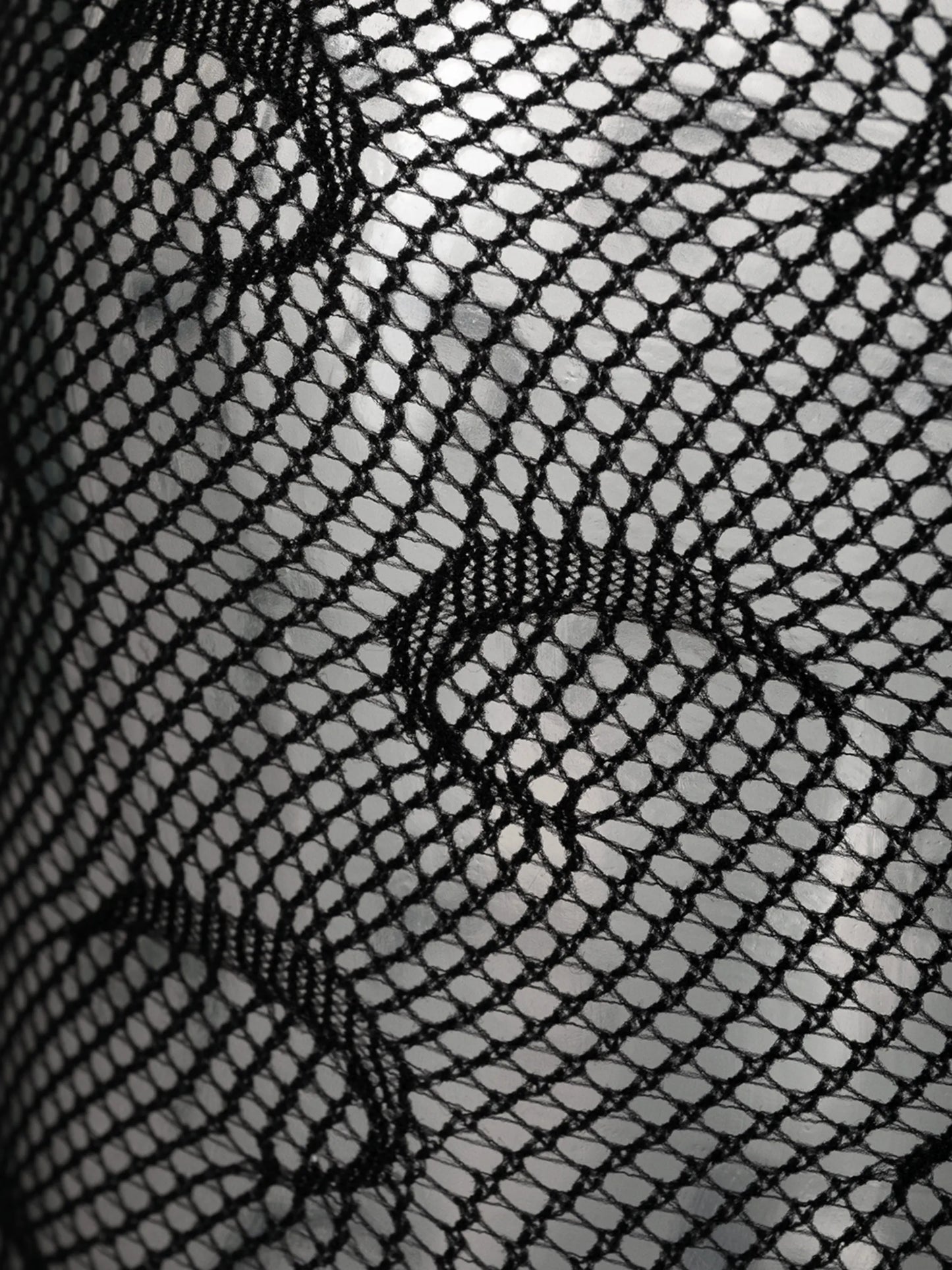 half-moon fishnet tights