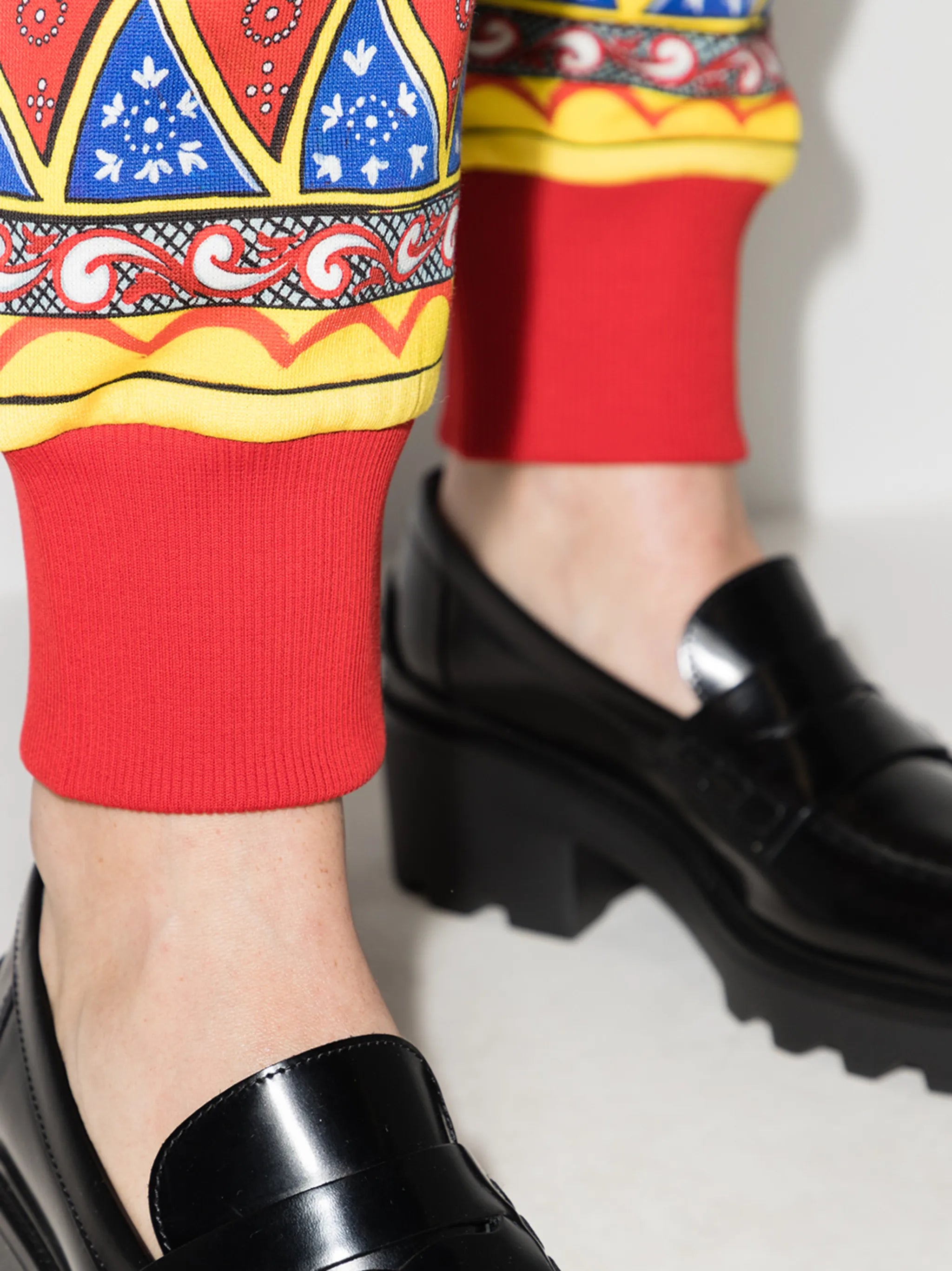 Caretto print jogging trousers