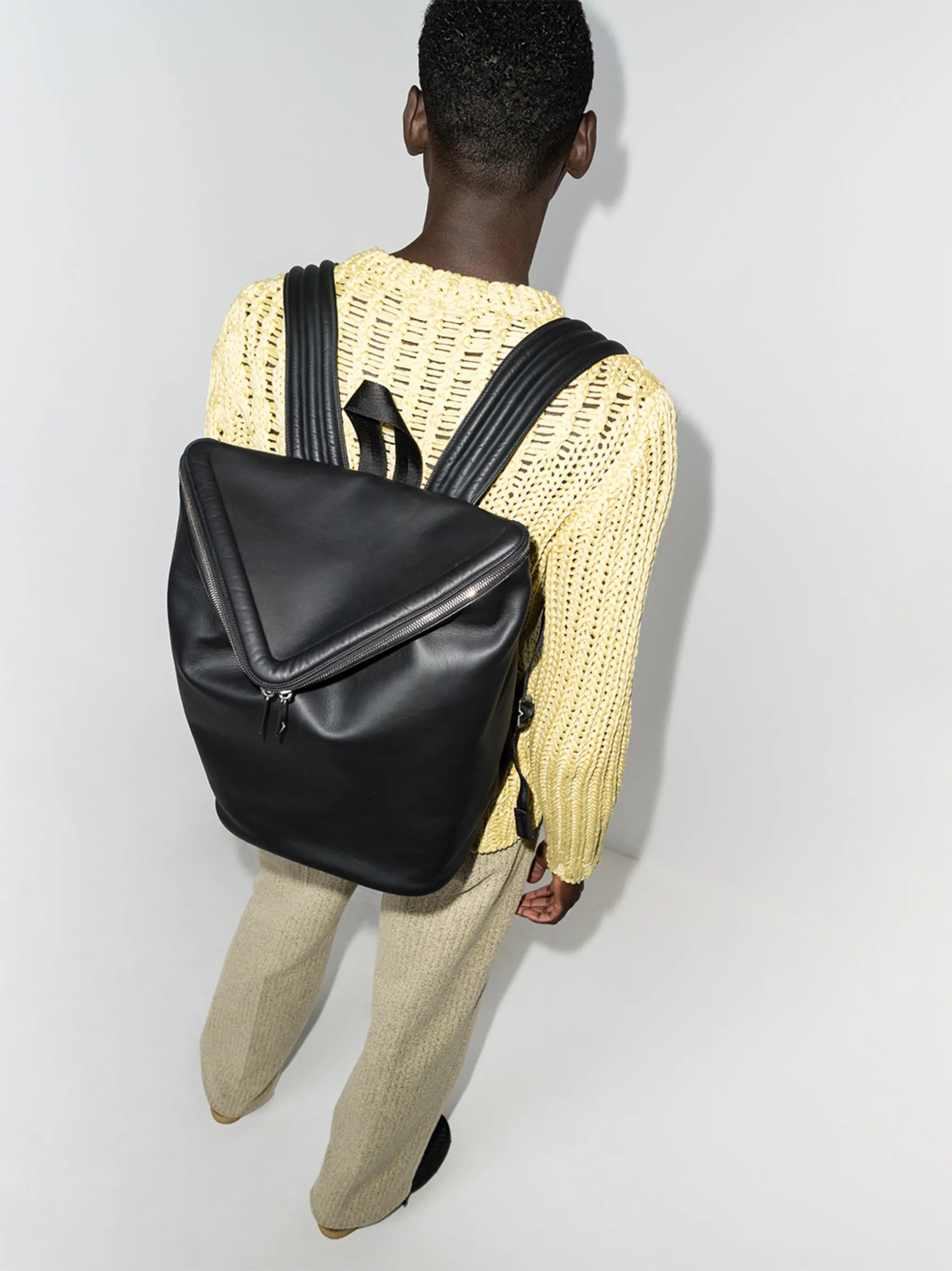 Beak triangular flap backpack