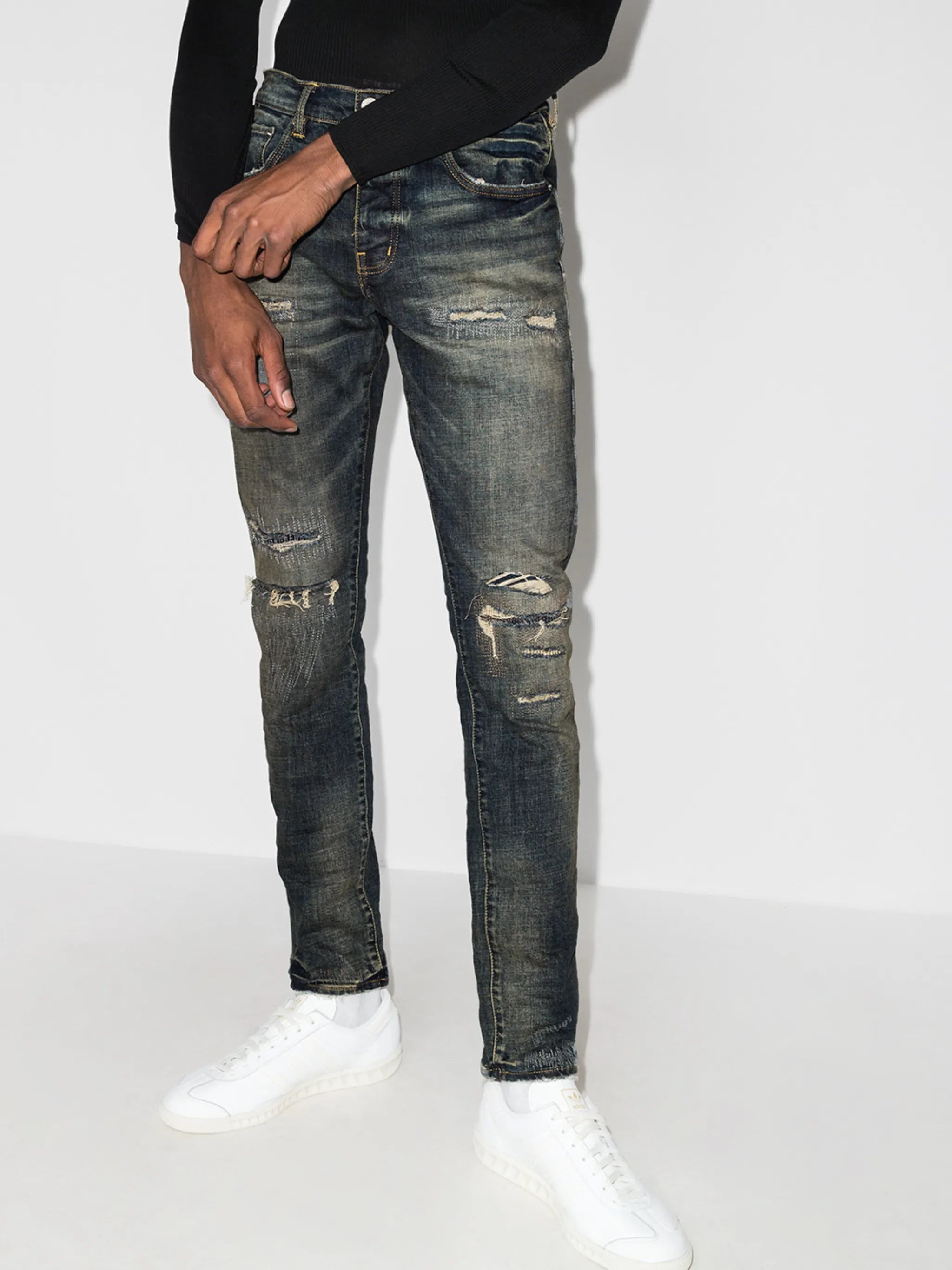 Repair distressed skinny jeans