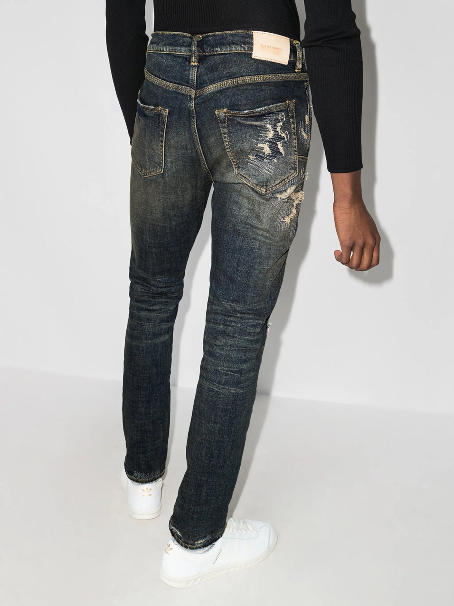 Repair distressed skinny jeans