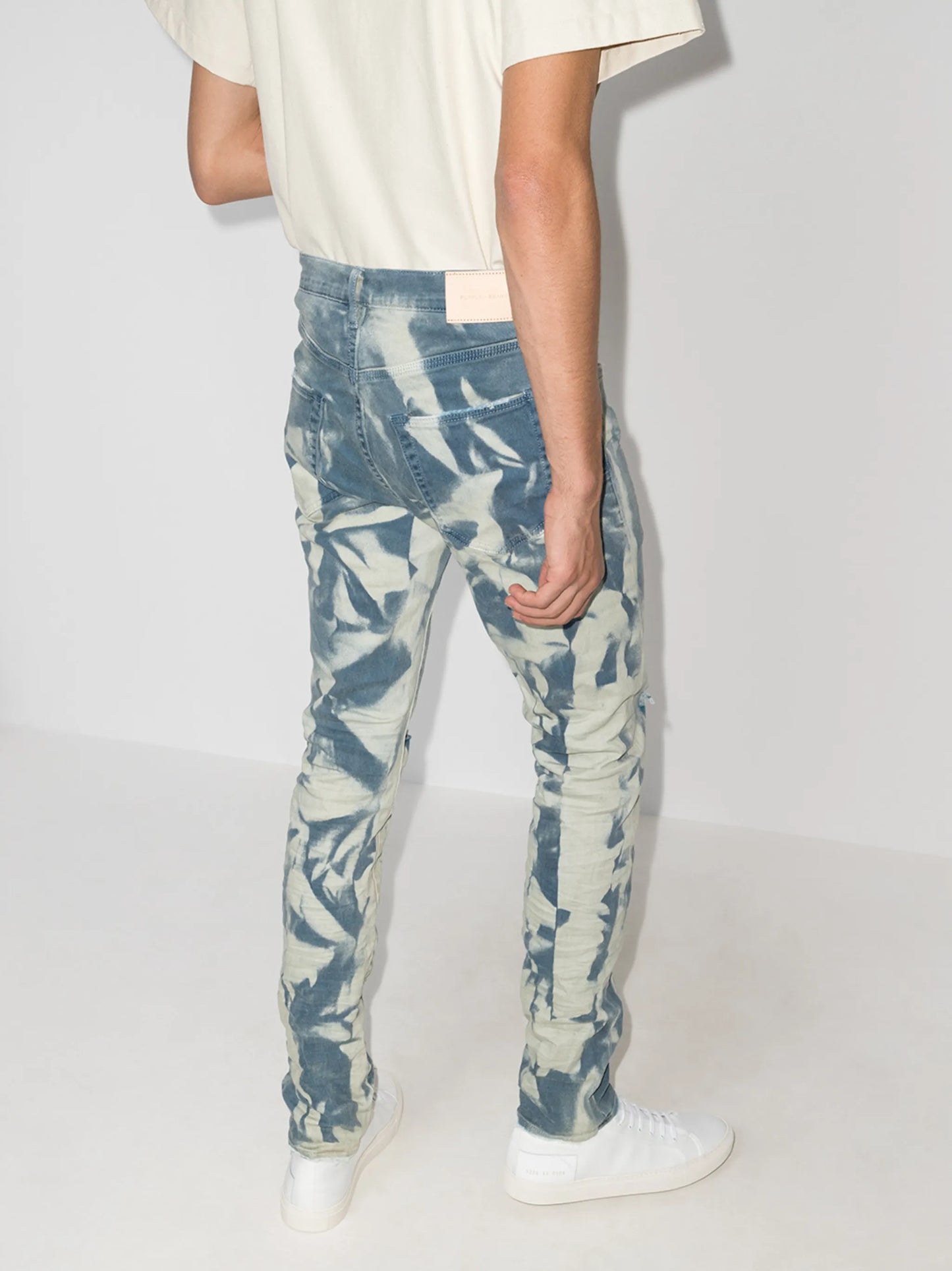 P001 sprayed slim-fit jeans
