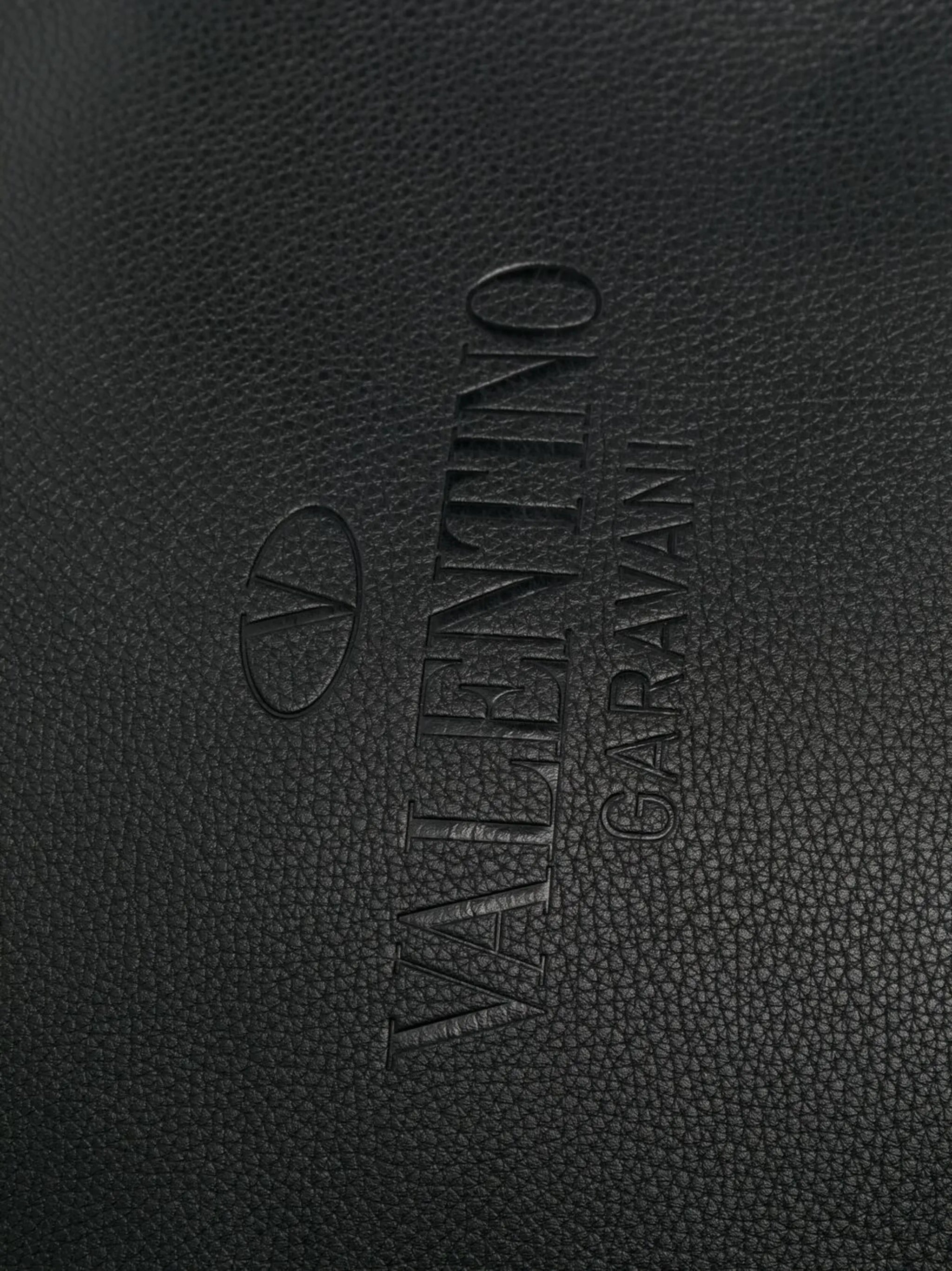 logo-embossed messenger bag